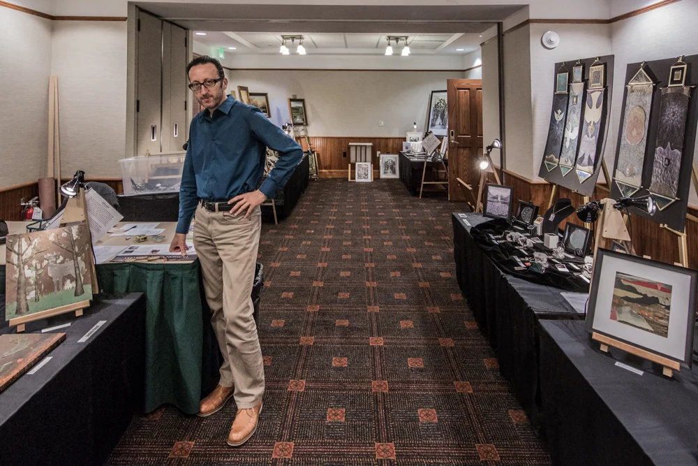 Sevan Melikyan sets up an art show at Mohonk Mountain House