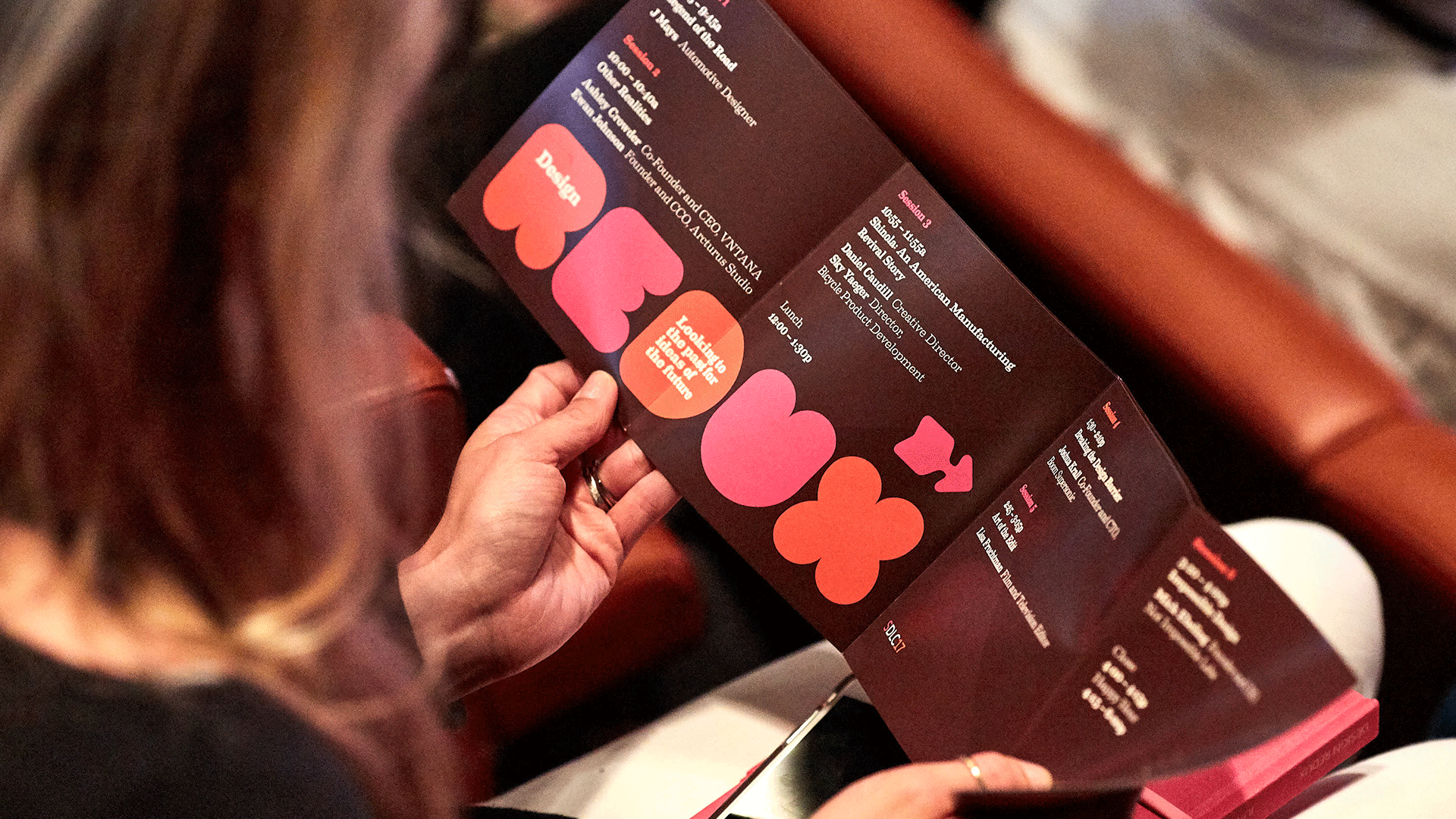 _woman_holding_brochure.gif