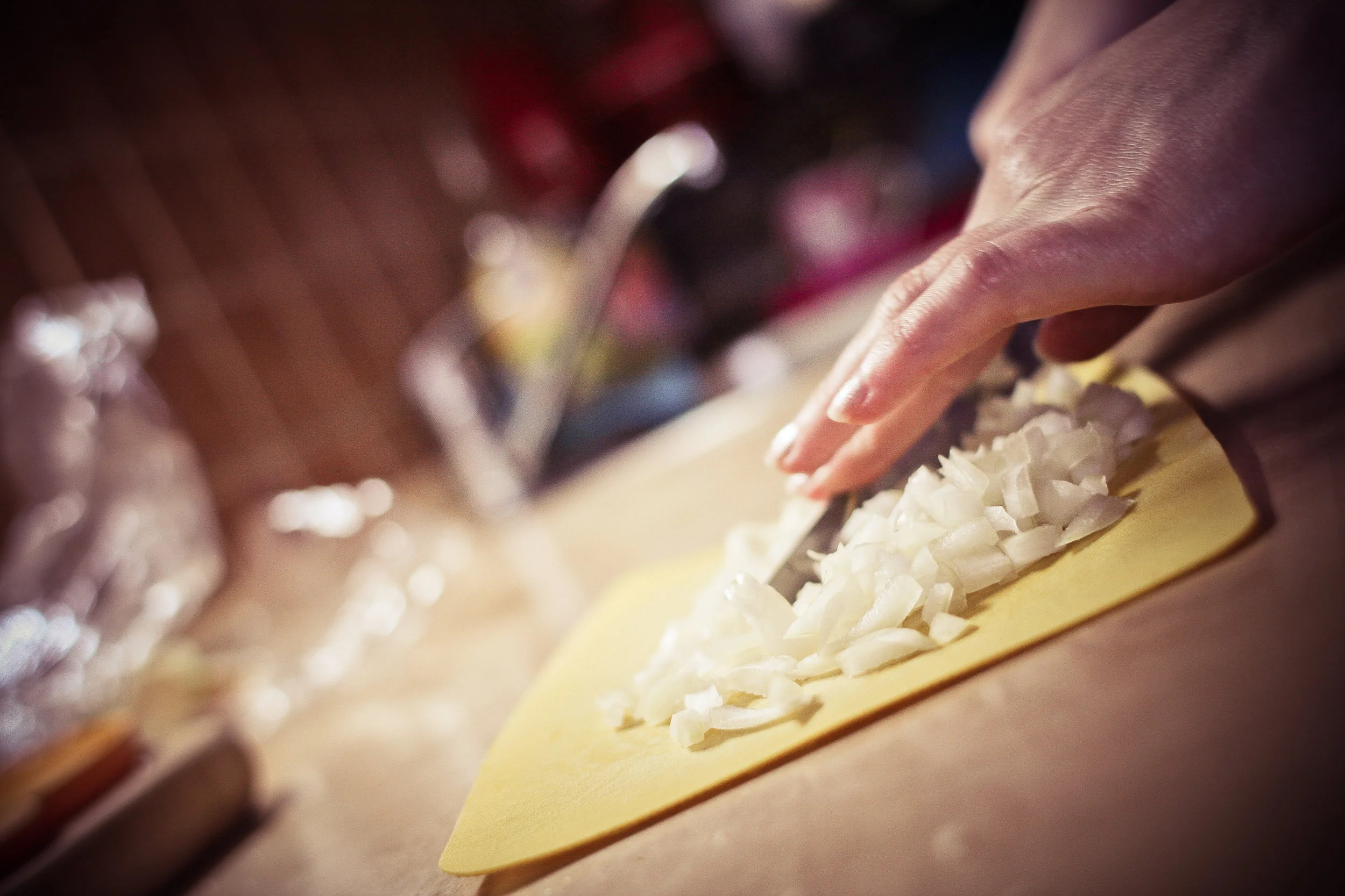 slicing-onions-in-the-kitchen-picjumbo-com.jpg