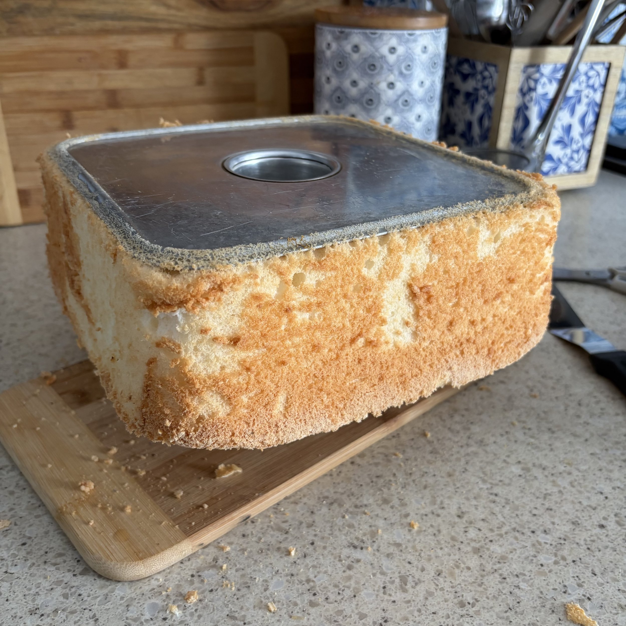 Removin angel foods cake from mold.jpeg