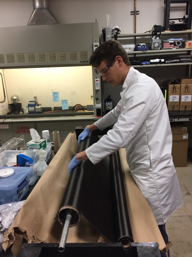 An Eclipse member rolls carbon fiber body tubes