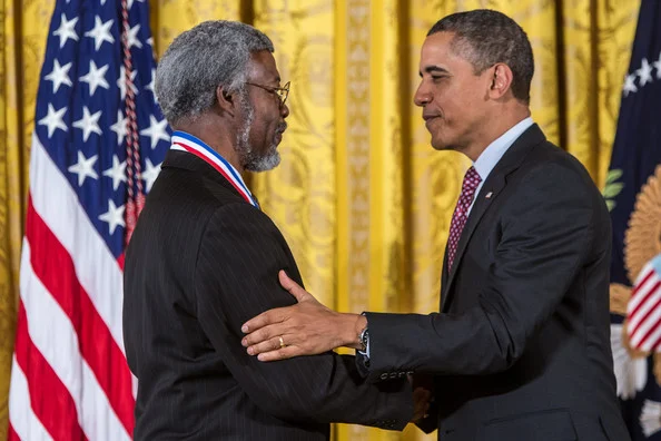President Barack Obama awards S. James Gates, Jr. '73 , PhD '77 the National Medal of Science, 1 February 2013.