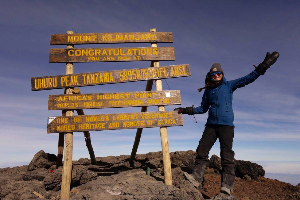 Anna at the summit of Mt. Kilimanjaro!