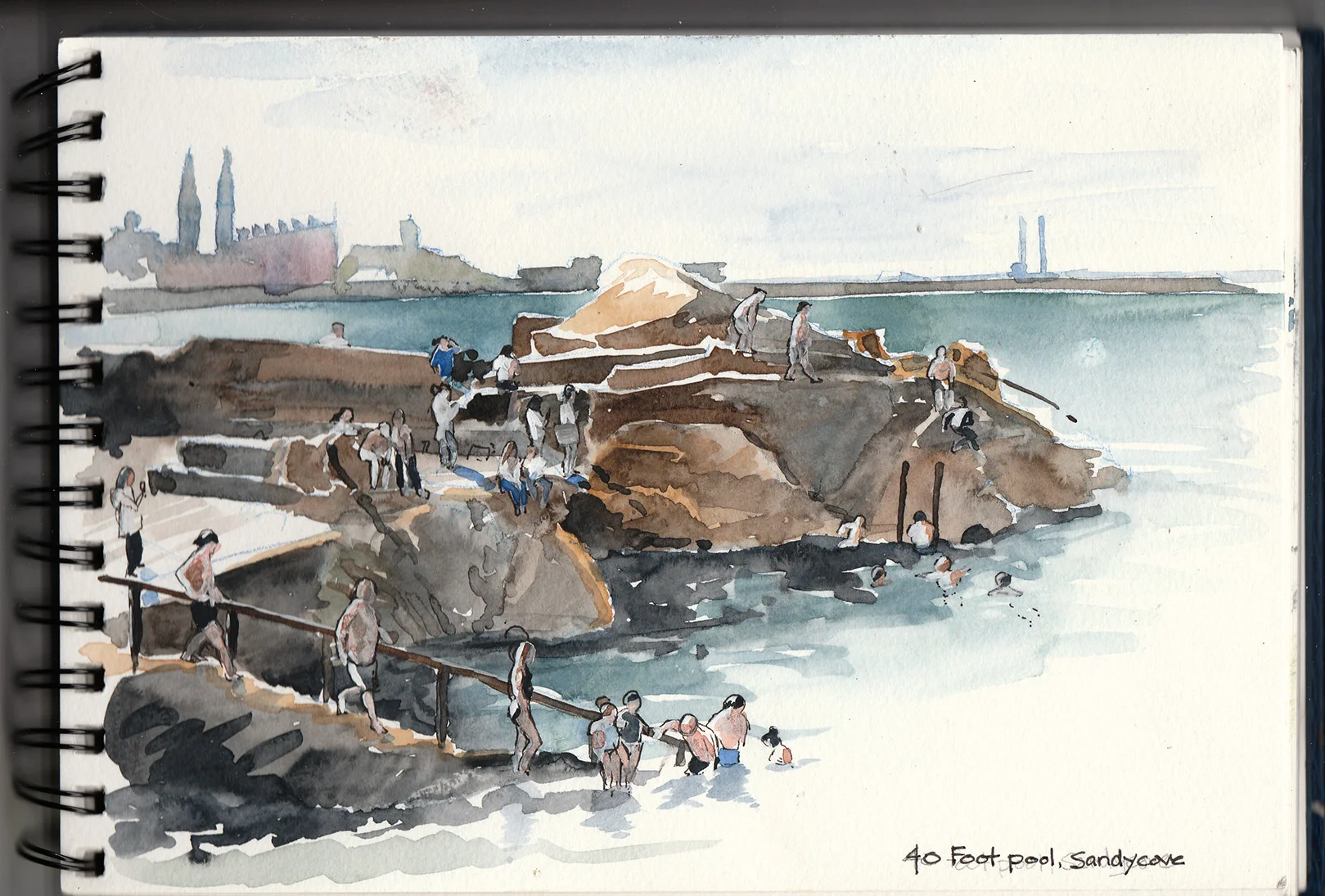 Sandycove's legendary swimming hole at 40 Foot Pool on a beautiful sunny July afternoon. Sketched in watercolour after a quick dip. Dun Loaghaire and Dublin in the background.