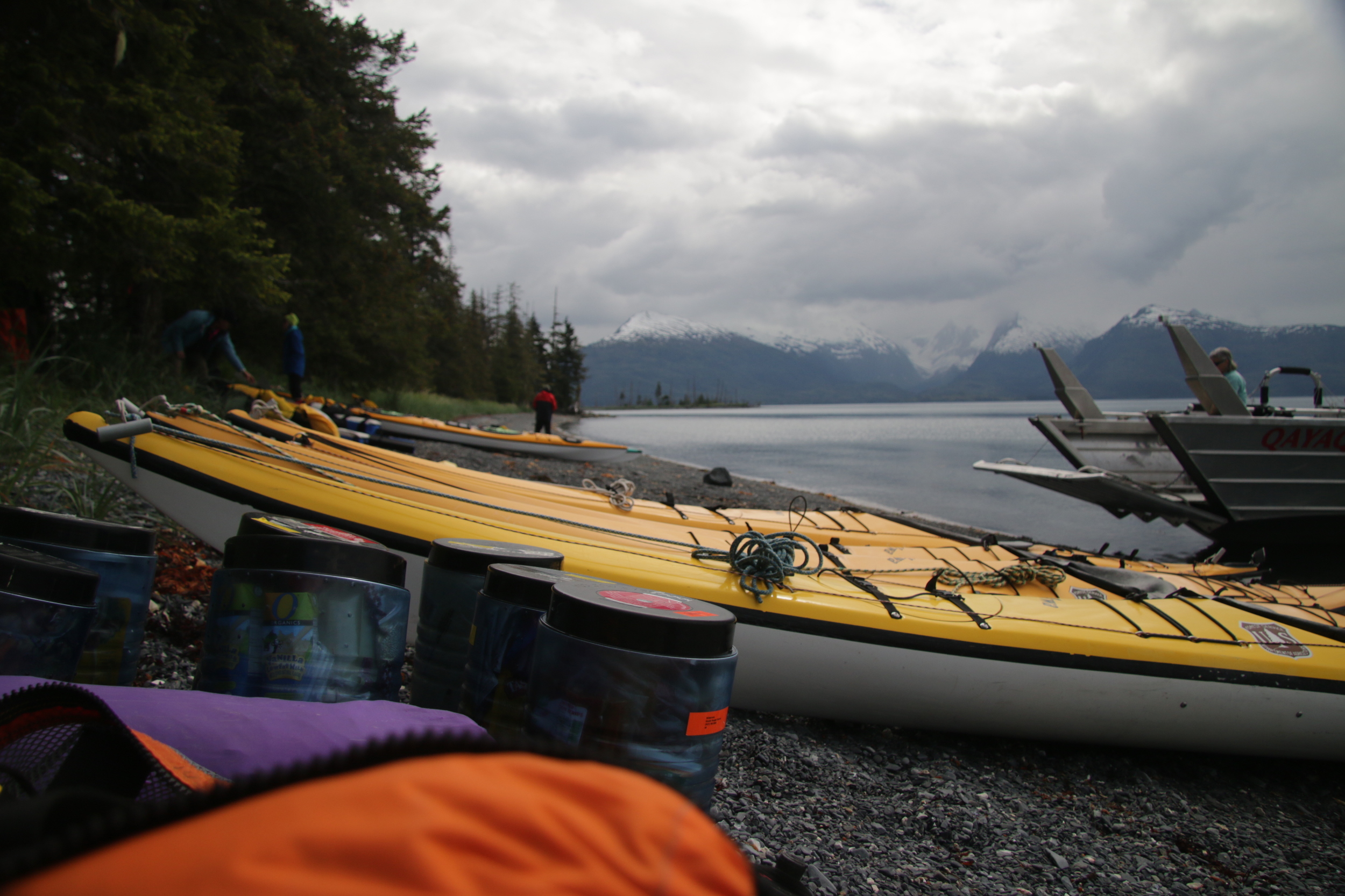 Offloading The Lazy Otter landing boat at Pakenham Point in Prince William Sound. Two standard sea kayaks for Barbara and Trace, one XL kayak for the artist and all his stuff, six bear barrels of food, two tents, thermarests, sleeping bags, rain gea…