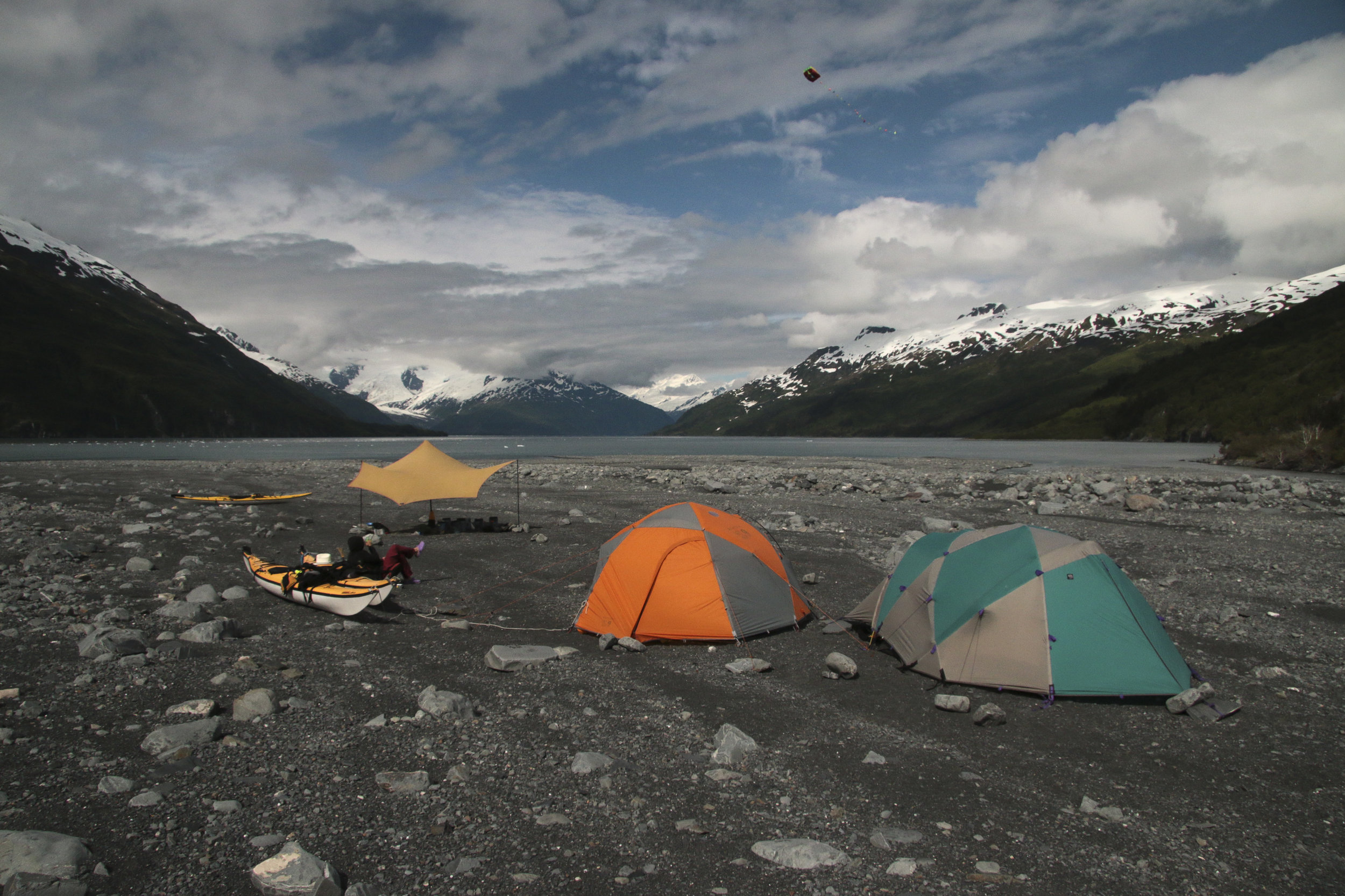 Once the weather cleared, the gravel field at the face of Harriman glacier was home for a few days. The tides are very high in the fjord so we parked our boats and made camp quite far from the water. Doubly smart since you never know when the glacie…