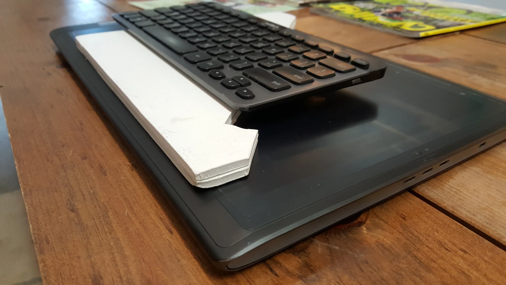 Folded up, it protects my screen from scratches when I bundle it into its pouch with the keyboard.