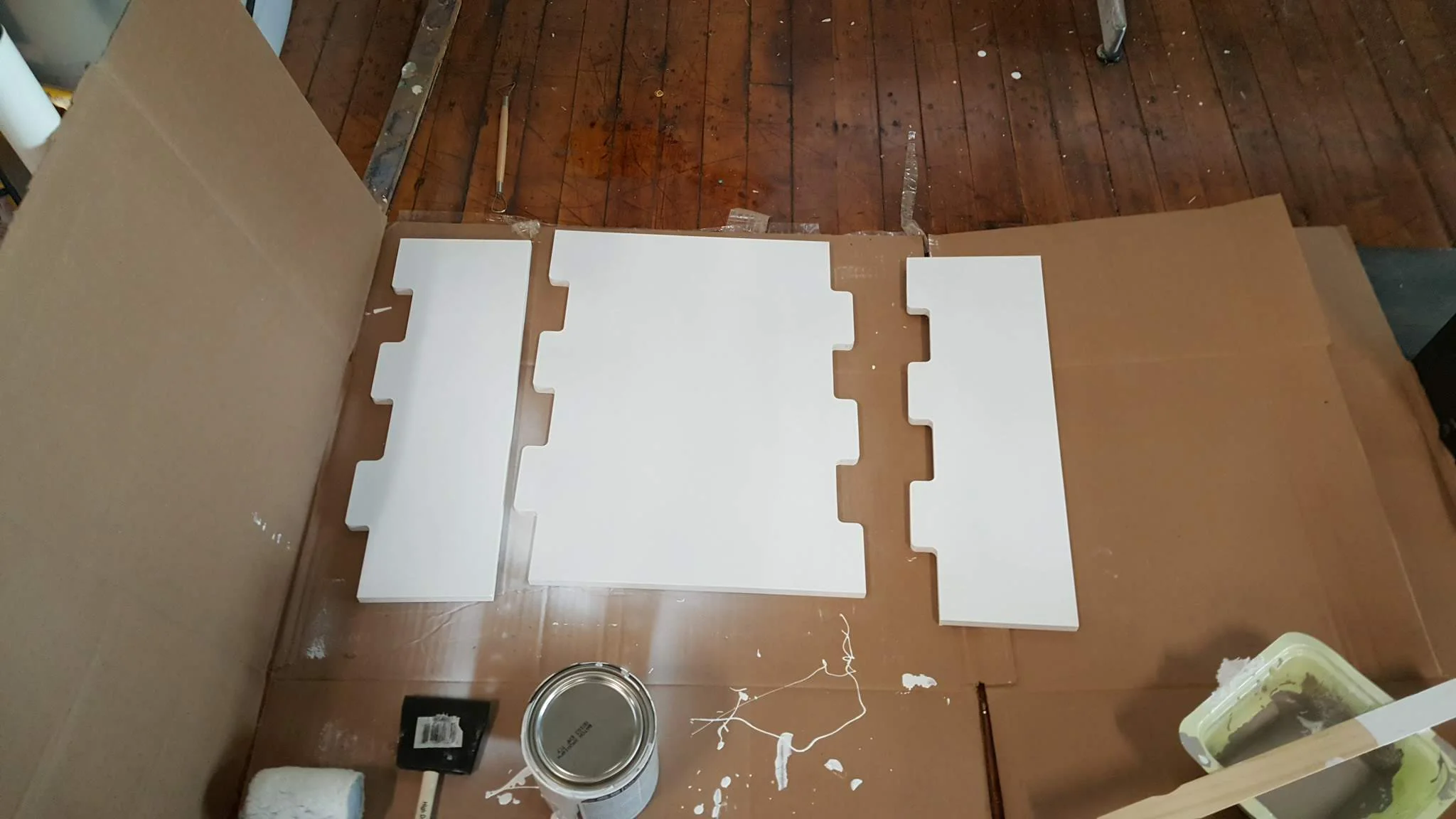 Painting the MDF base panels.