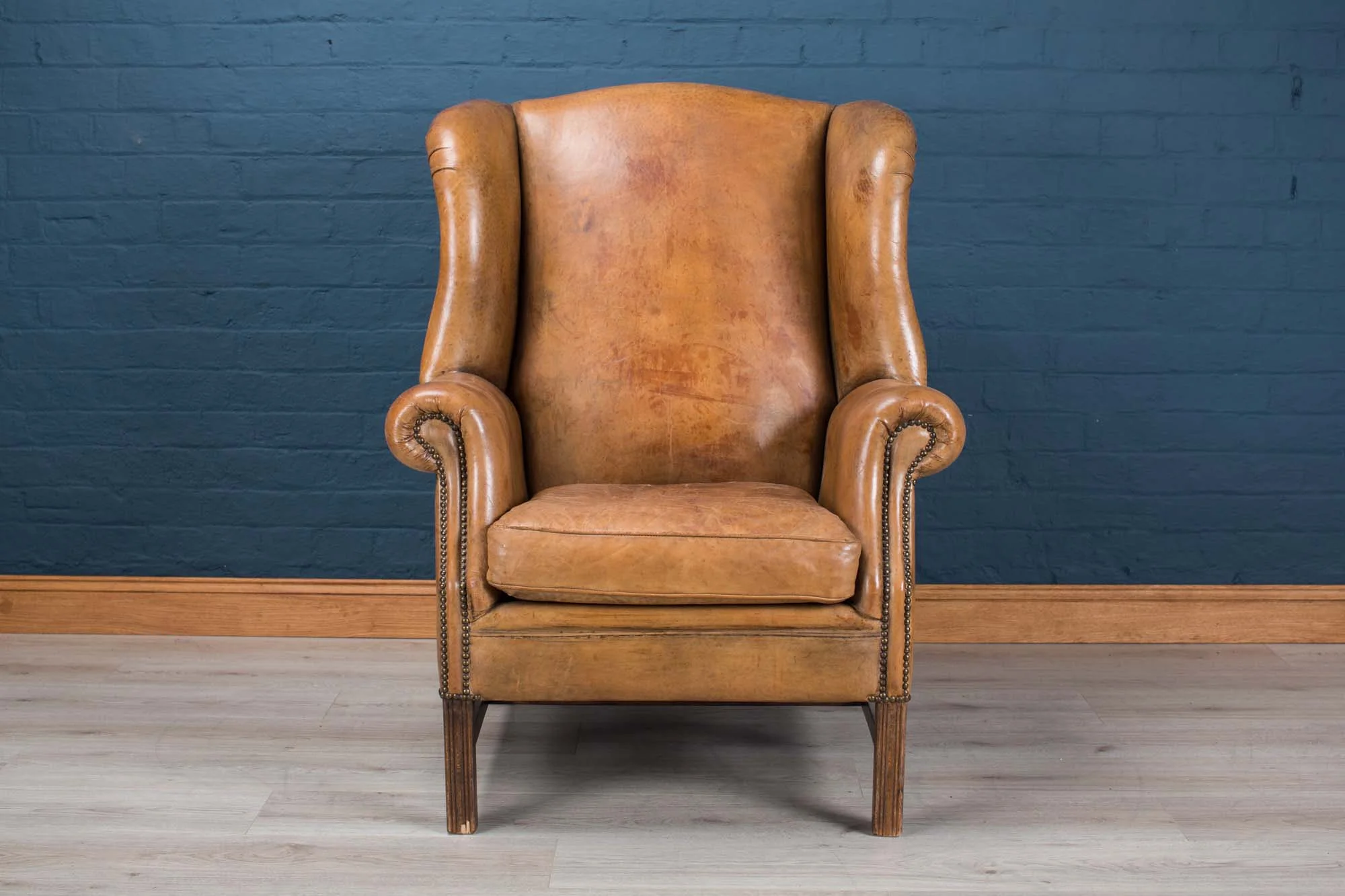 Leather wing-back chair, late 20th century
