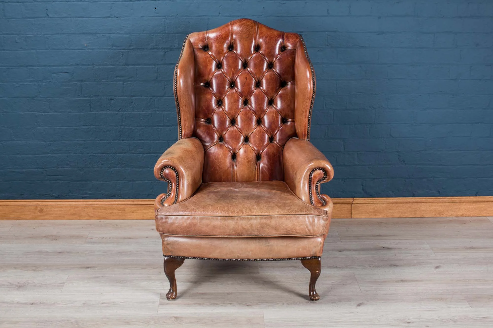 Leather wing back chair, mid 20th century