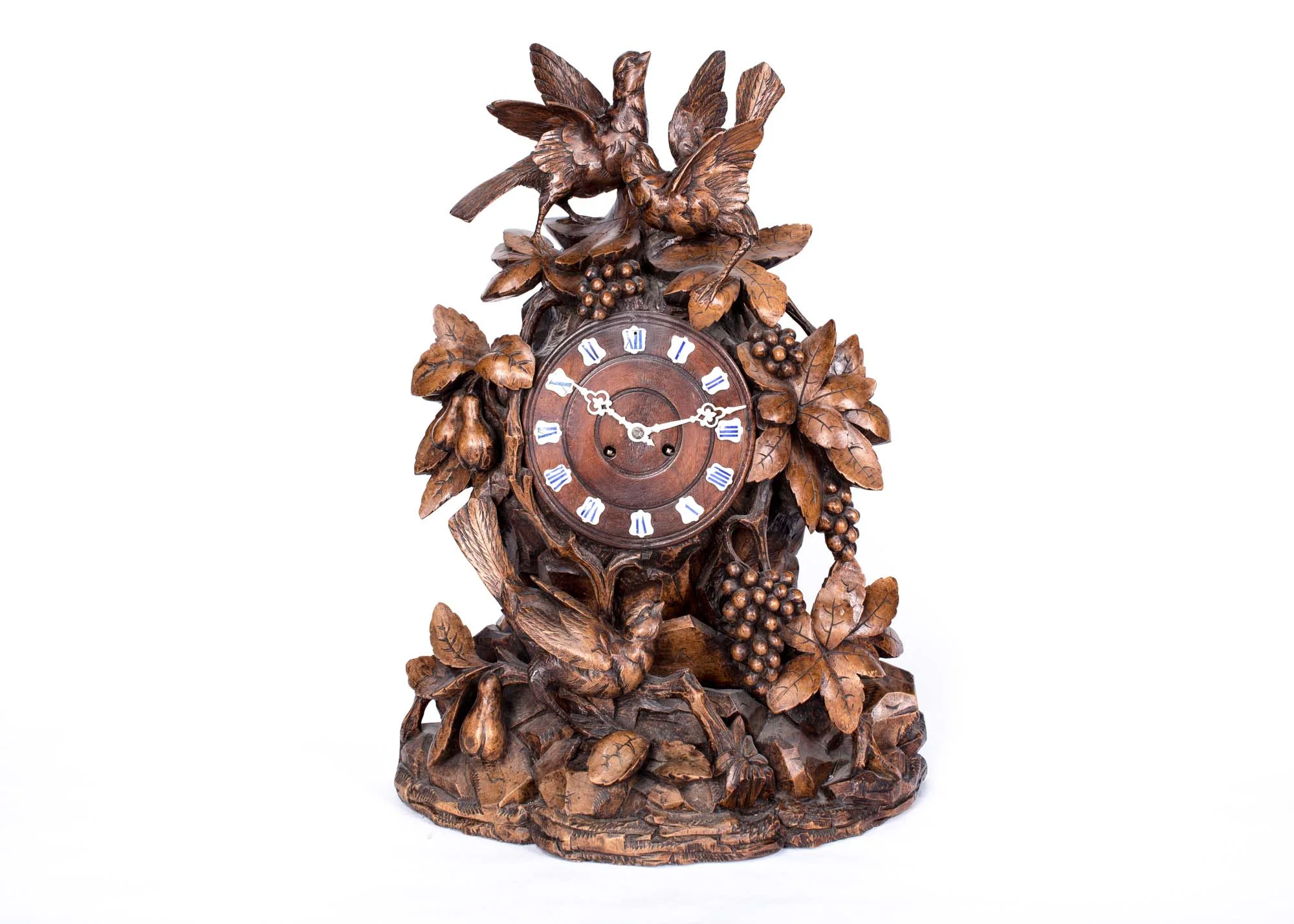 A beautifully carved Black Forest clock, circa 1880