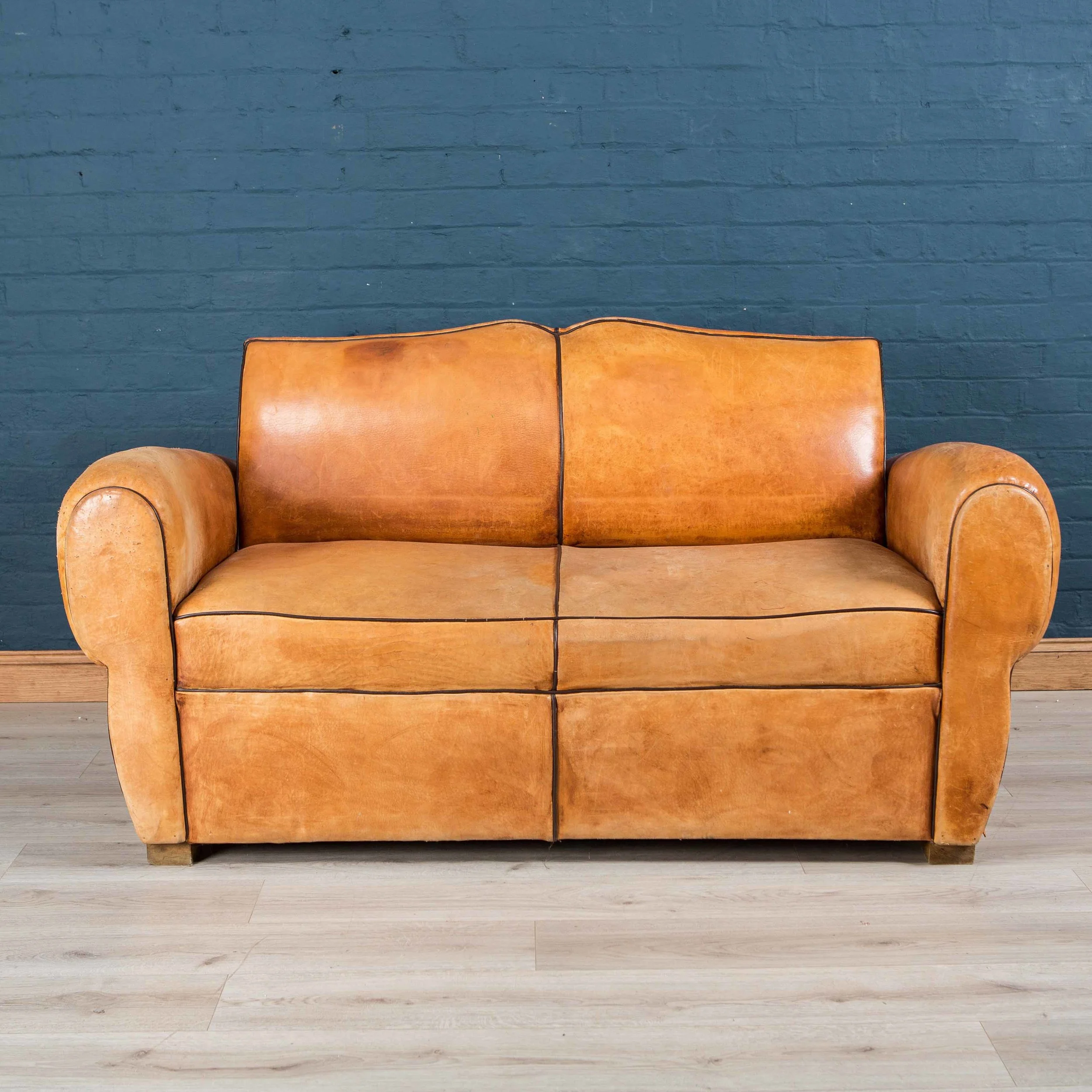 Handsome mid 20th century French leather sofa