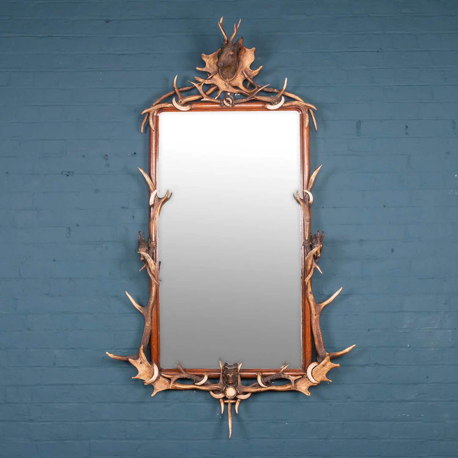Unusual large black forest mirror, late 19th / early 20th century