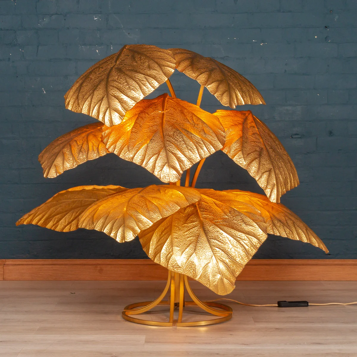 A nine-leaf floor lamp by Tommaso Barbi, Italy, circa 1970