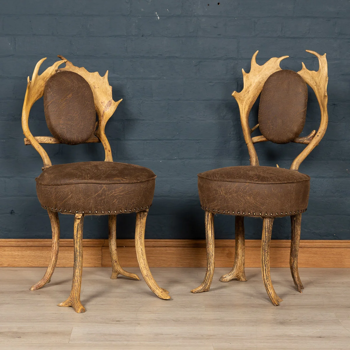 A pair of hall chairs fashioned from antler horns, Germany, circa 1880