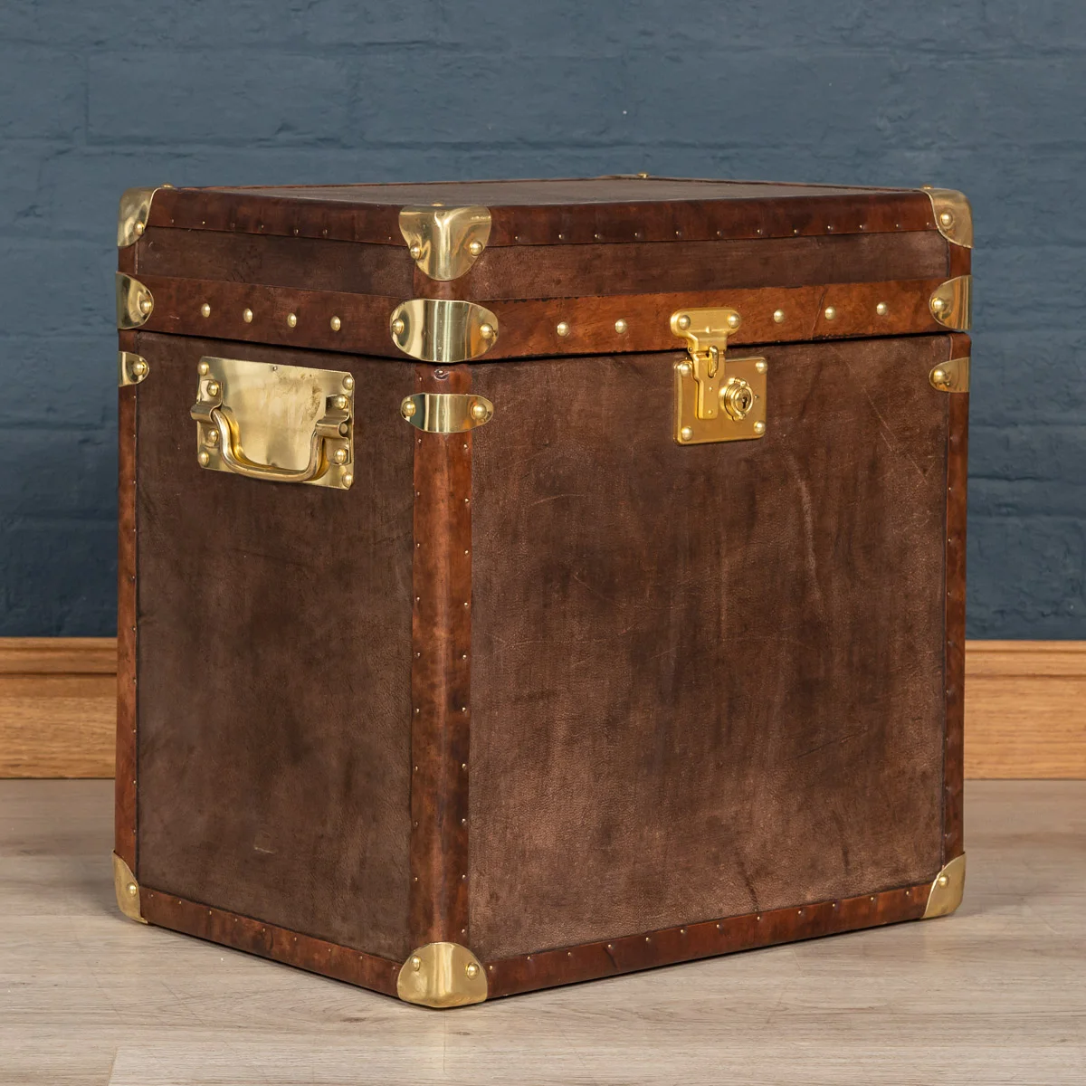 A modern leather covered trunk, hand made in England.