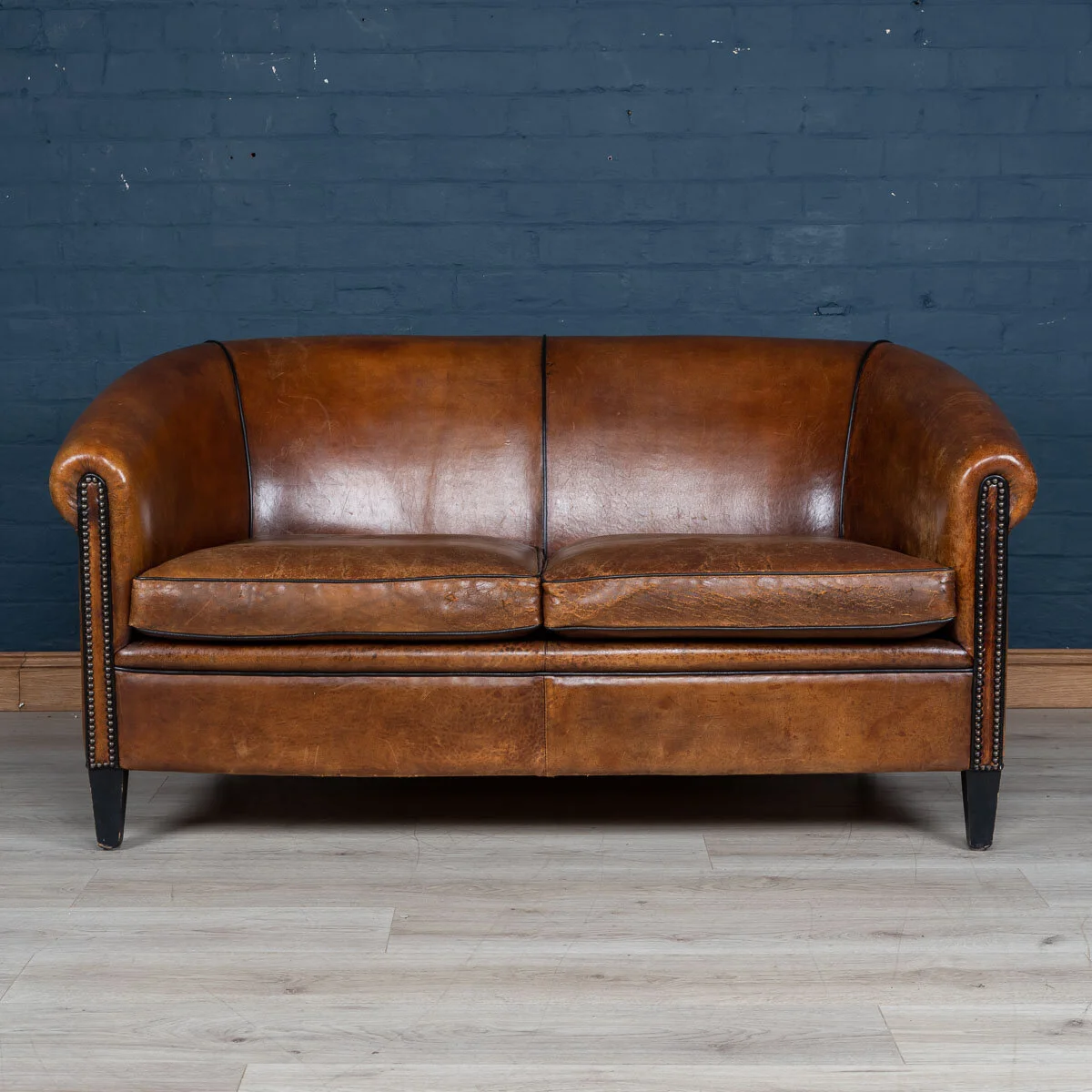 A two seater leather sofa, Holland, late 20th century