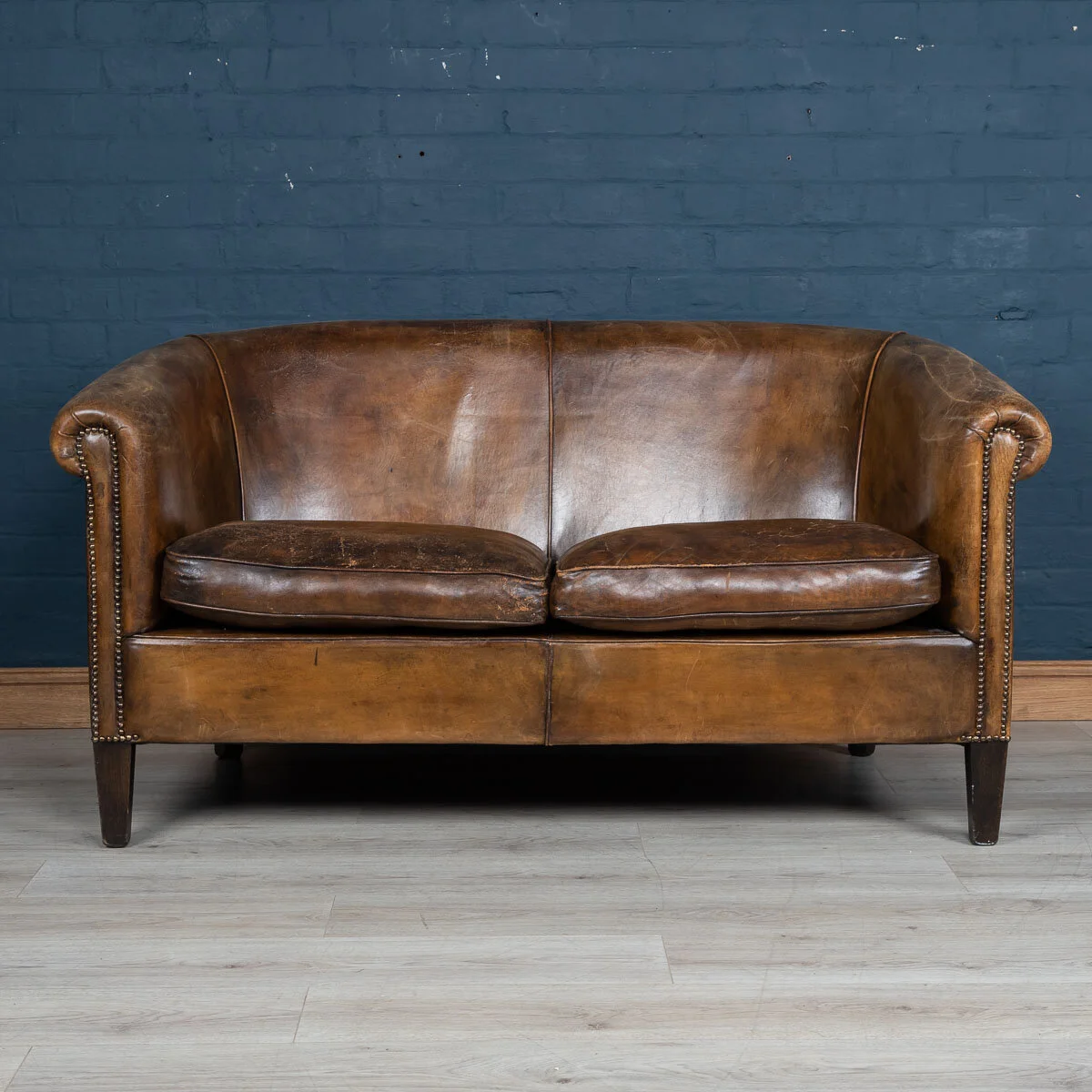 A two seater leather sofa, Holland, late 20th century