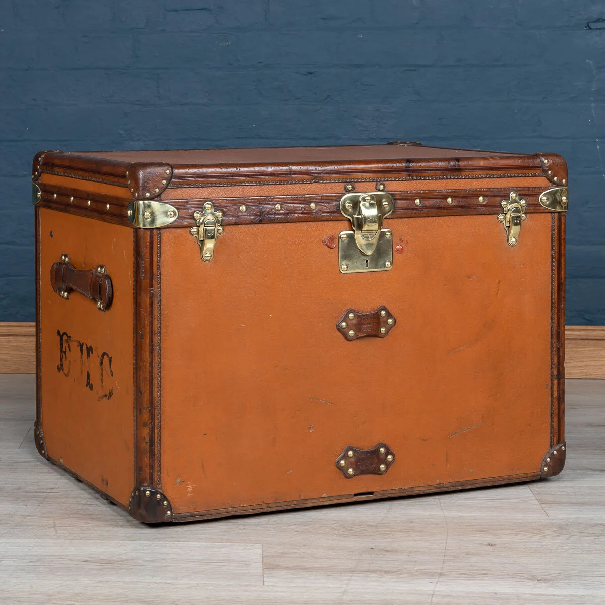 A Louis Vuitton courier trunk in orange Vuittonite canvas, France, circa 1905