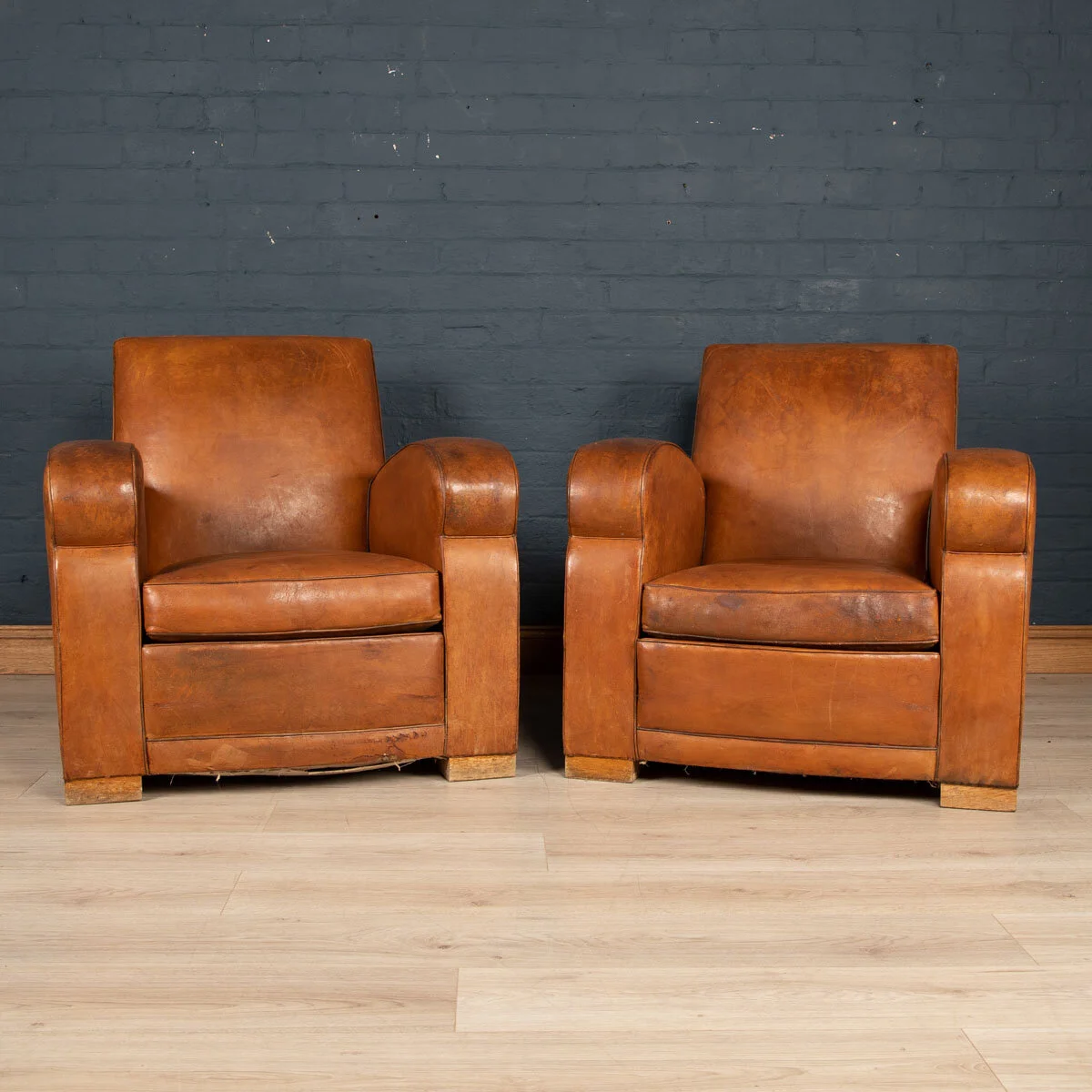 A pair of leather club chairs, France, circa 1930