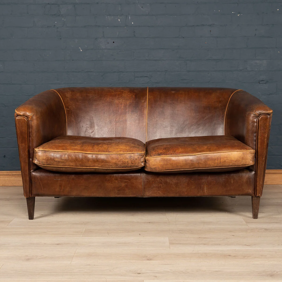A two seater leather sofa, Holland, late 20th century