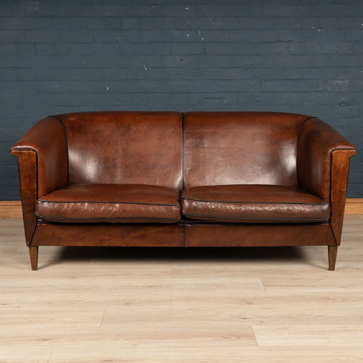 A two/three seater leather sofa, Holland, late 20th century