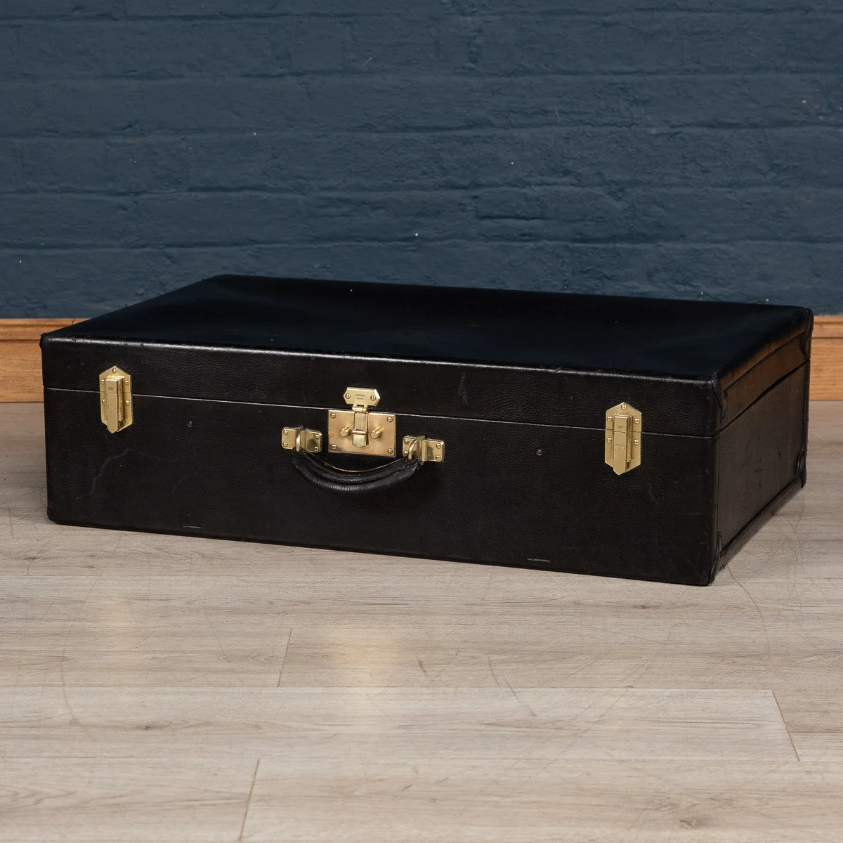 A Hermes suitcase in black leatherette, France, circa 1940