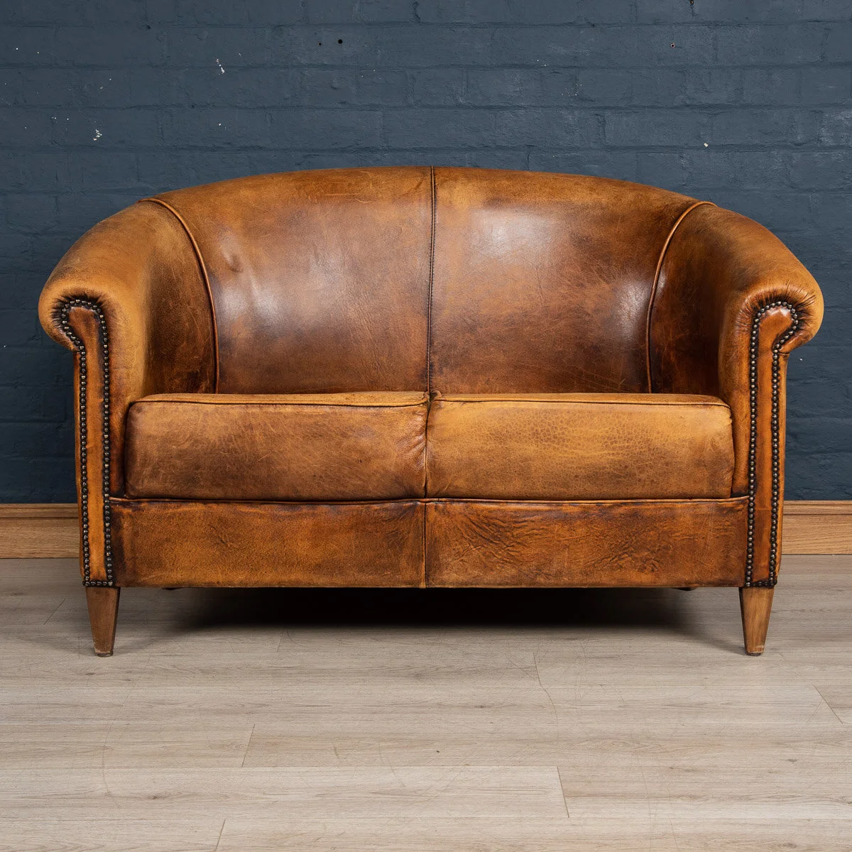 A sheepskin leather two seater sofa, Holland, late 20th century