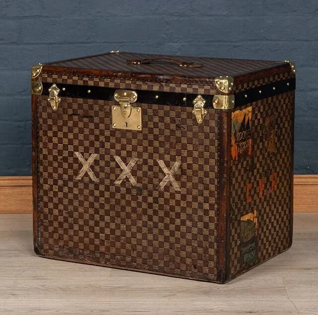 A lovely example of an early 20th century Goyard hat trunk covered in the very unusual &ldquo;checkerboard&rdquo; canvas rather than the more common chevron canvas. This unusually sized trunk is in very good condition and harks back to times of passe