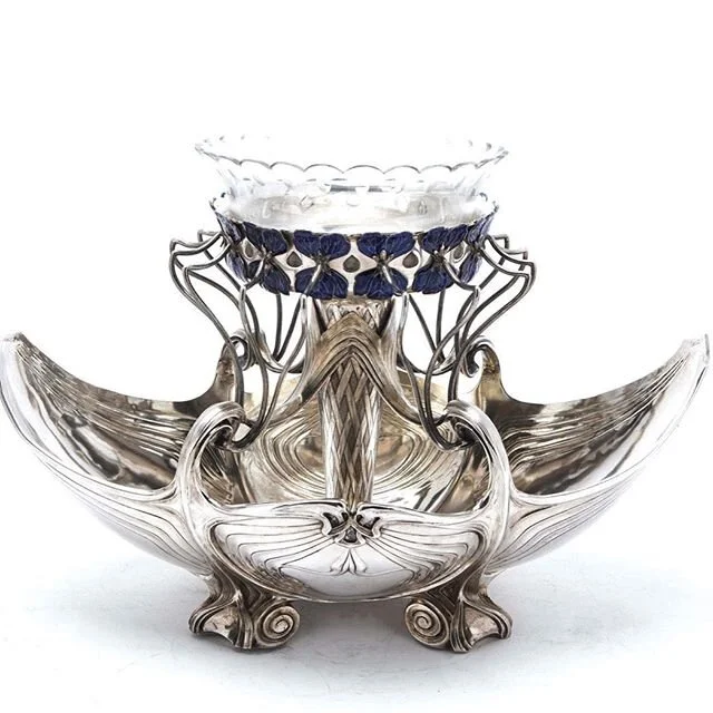 Impressive large solid silver centrepiece with enamel detailing dating to the first decade of the 20th century, with strong art nouveau influence, typical of the era. For more information please visit www.alessiolorenzi.com &bull;
&bull;
&bull;
&bull