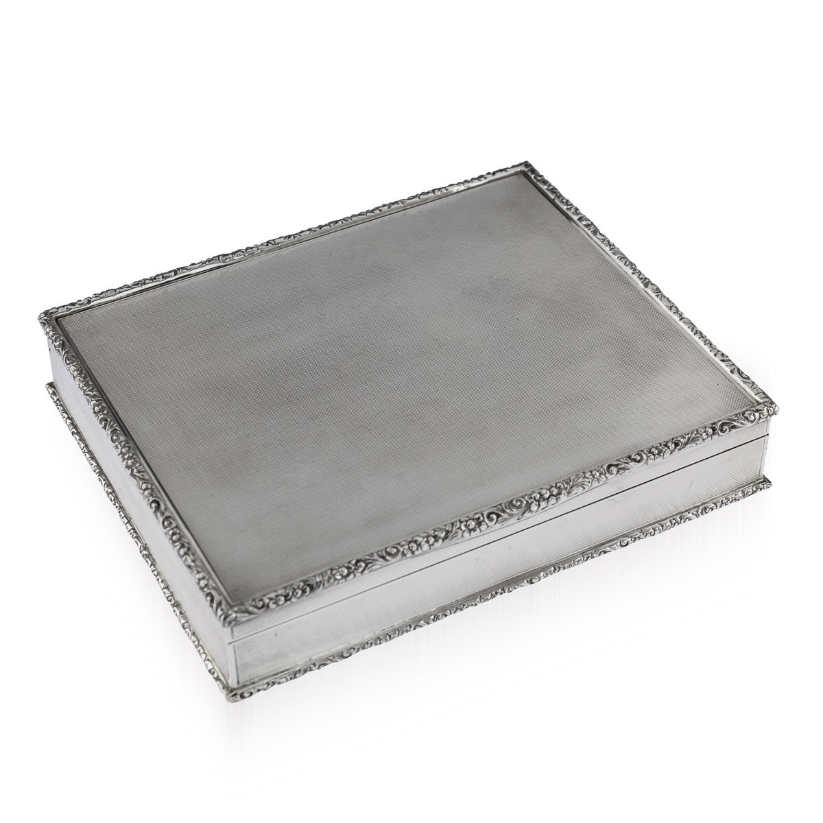 A solid silver cigar box by Richard Comyns, London, 1960