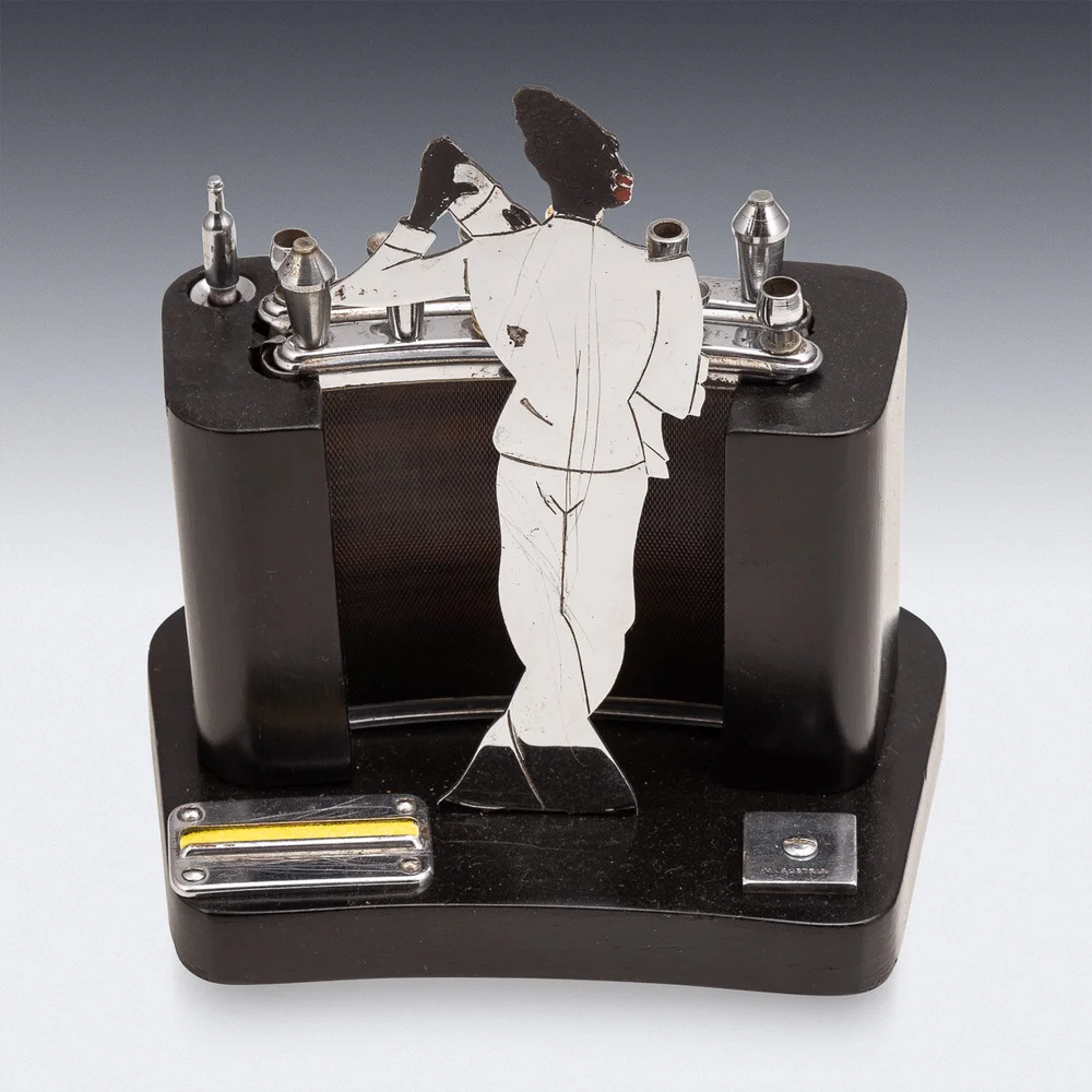 An antique 20th century Art Deco bar shaped cigarette dispenser, circa 1920  — Alessio Lorenzi