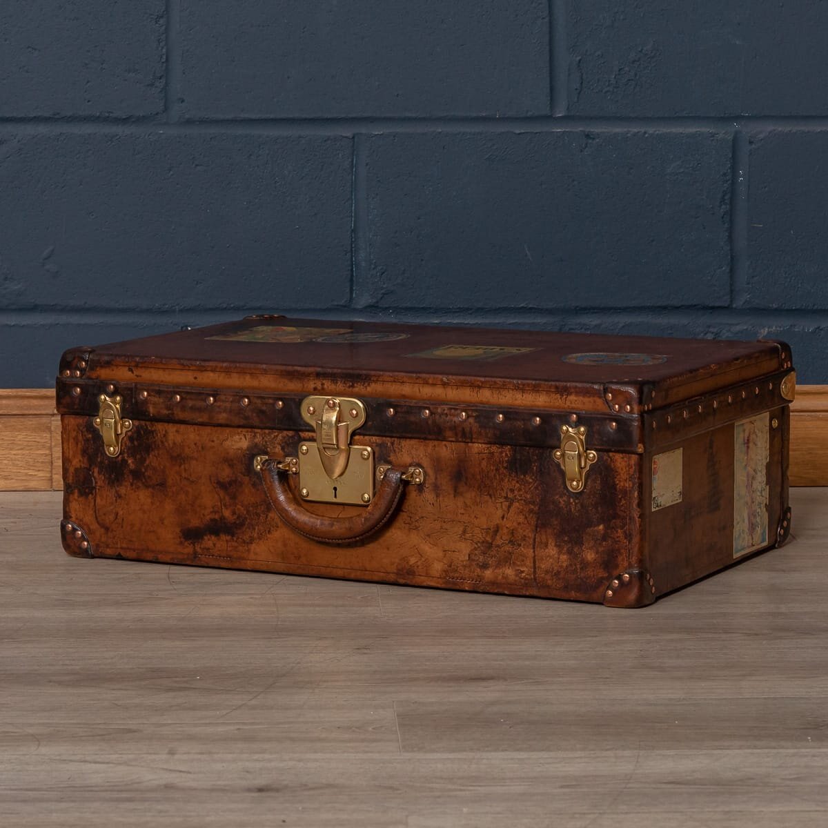 A Louis Vuitton suitcase in natural cow hide, circa 1900