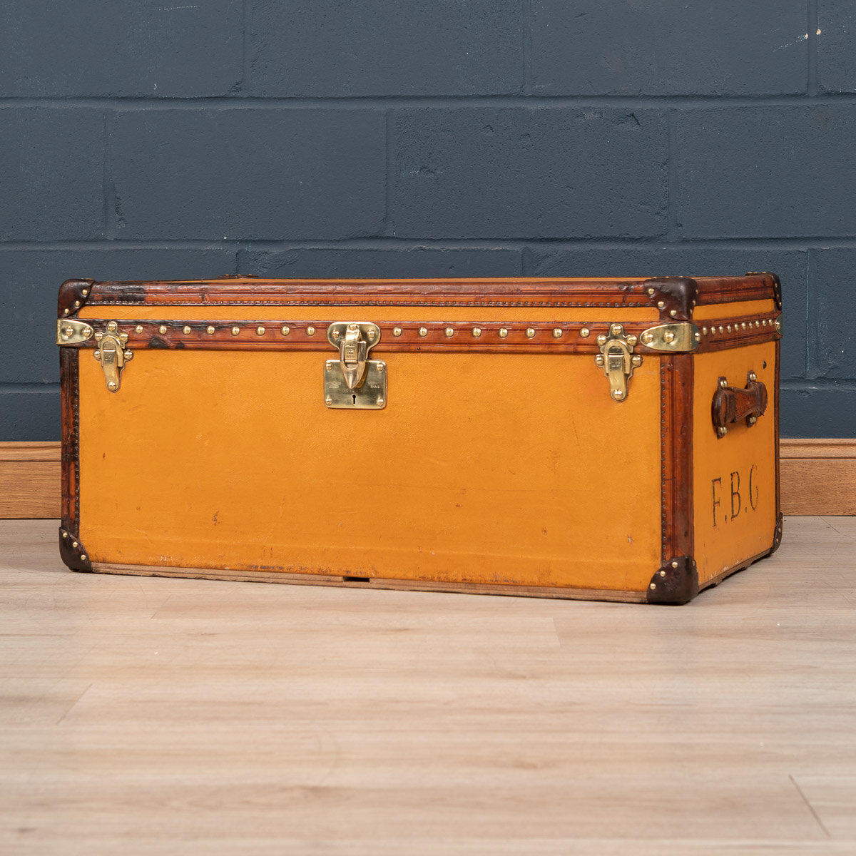 A Louis Vuitton cabin trunk in orange Vuittonite canvas, France, circa 1905