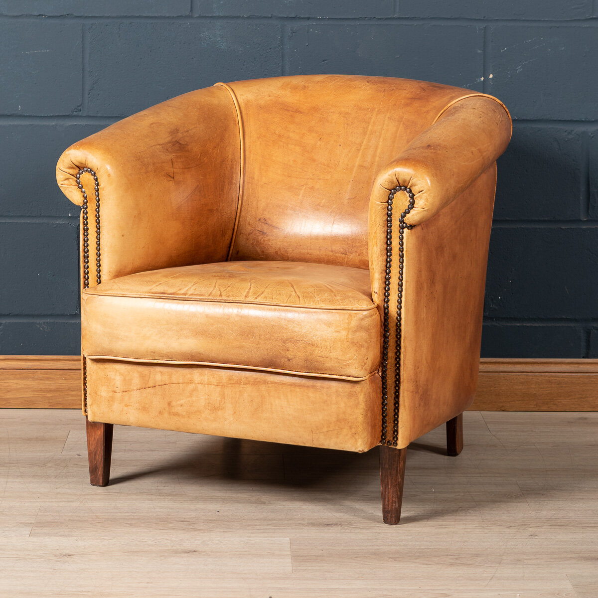 A sheepskin leather tub chair, Holland, late 20th century