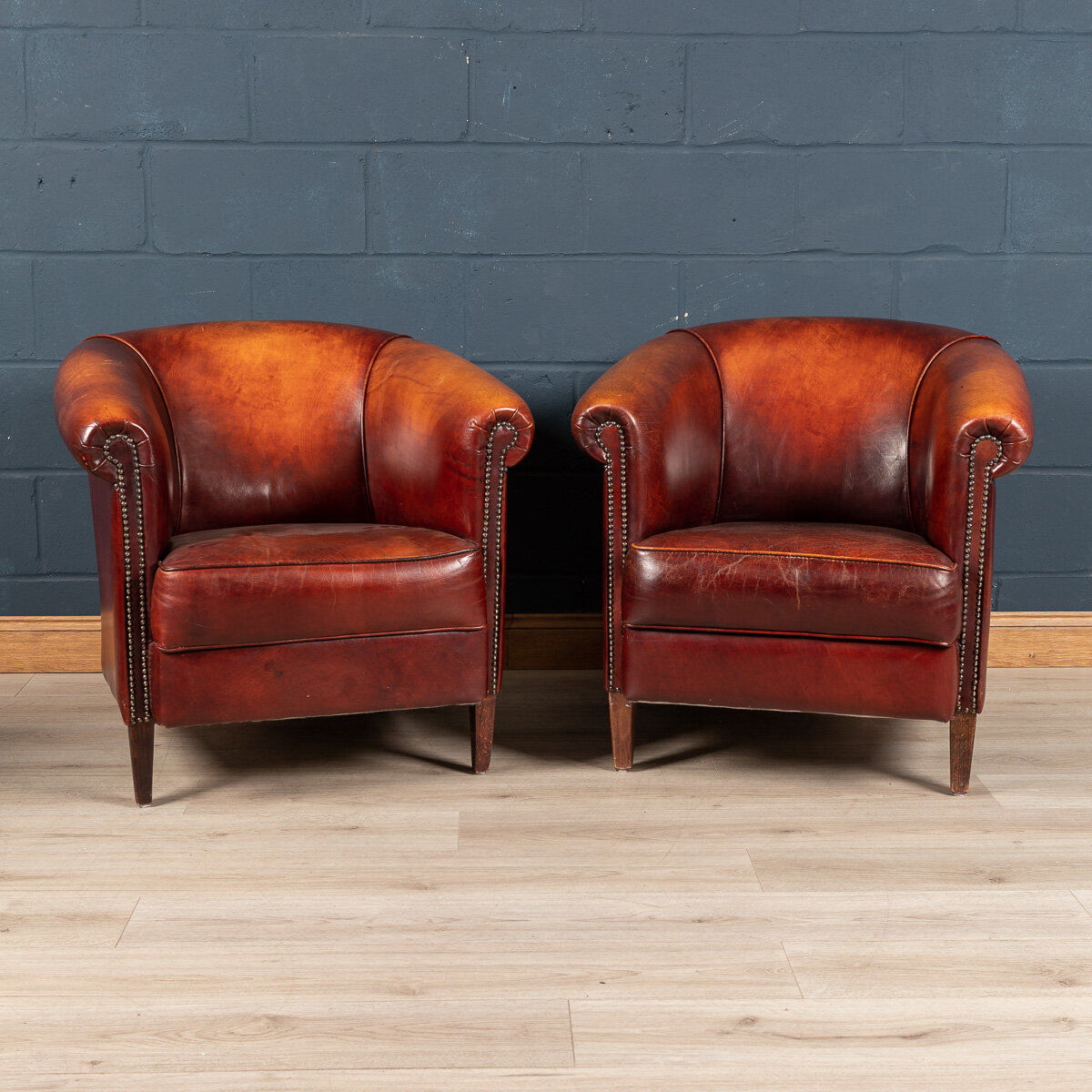 A pair of sheepskin leather club chairs, Holland, late 20th century