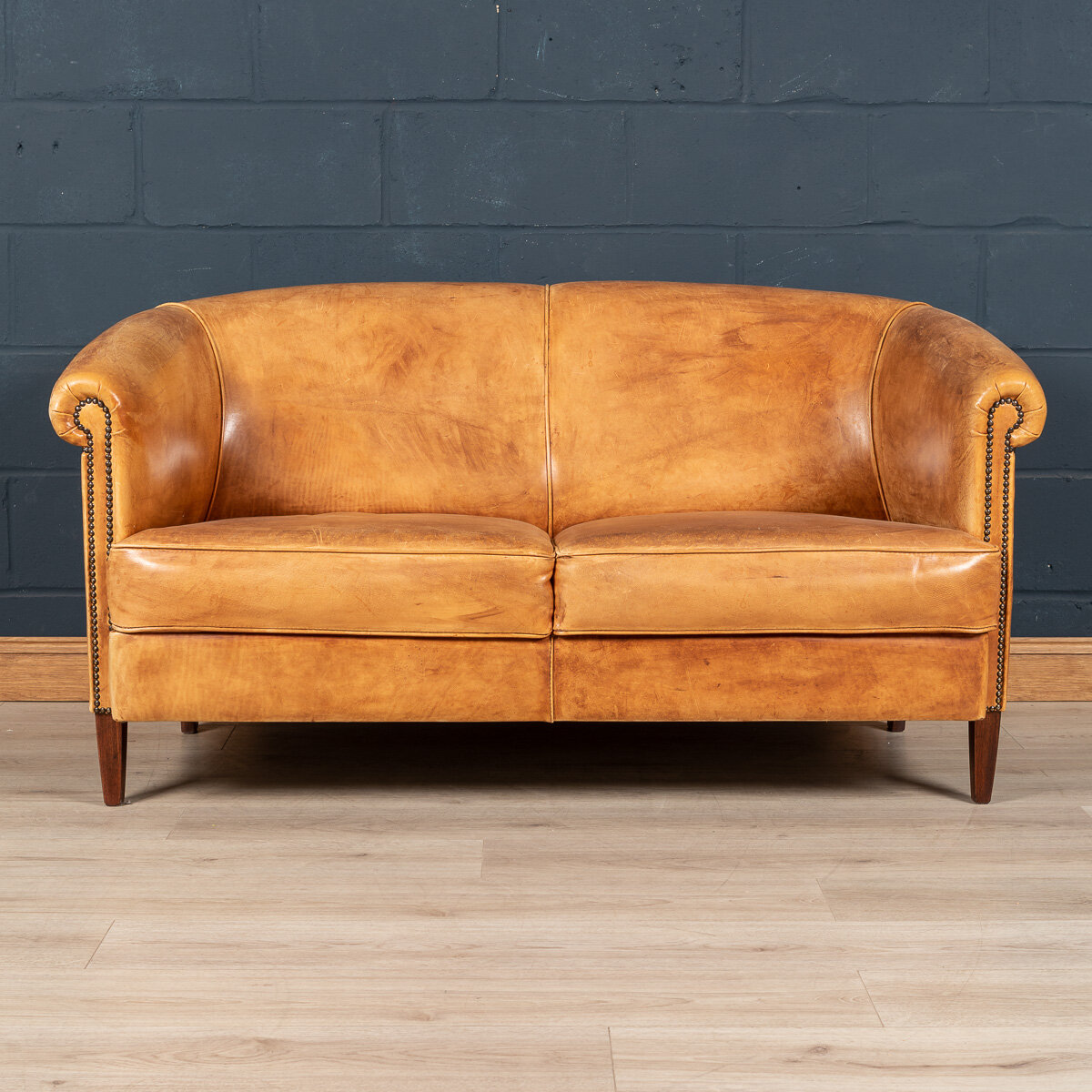 A tan sheepskin leather sofa, Holland, late 20th century