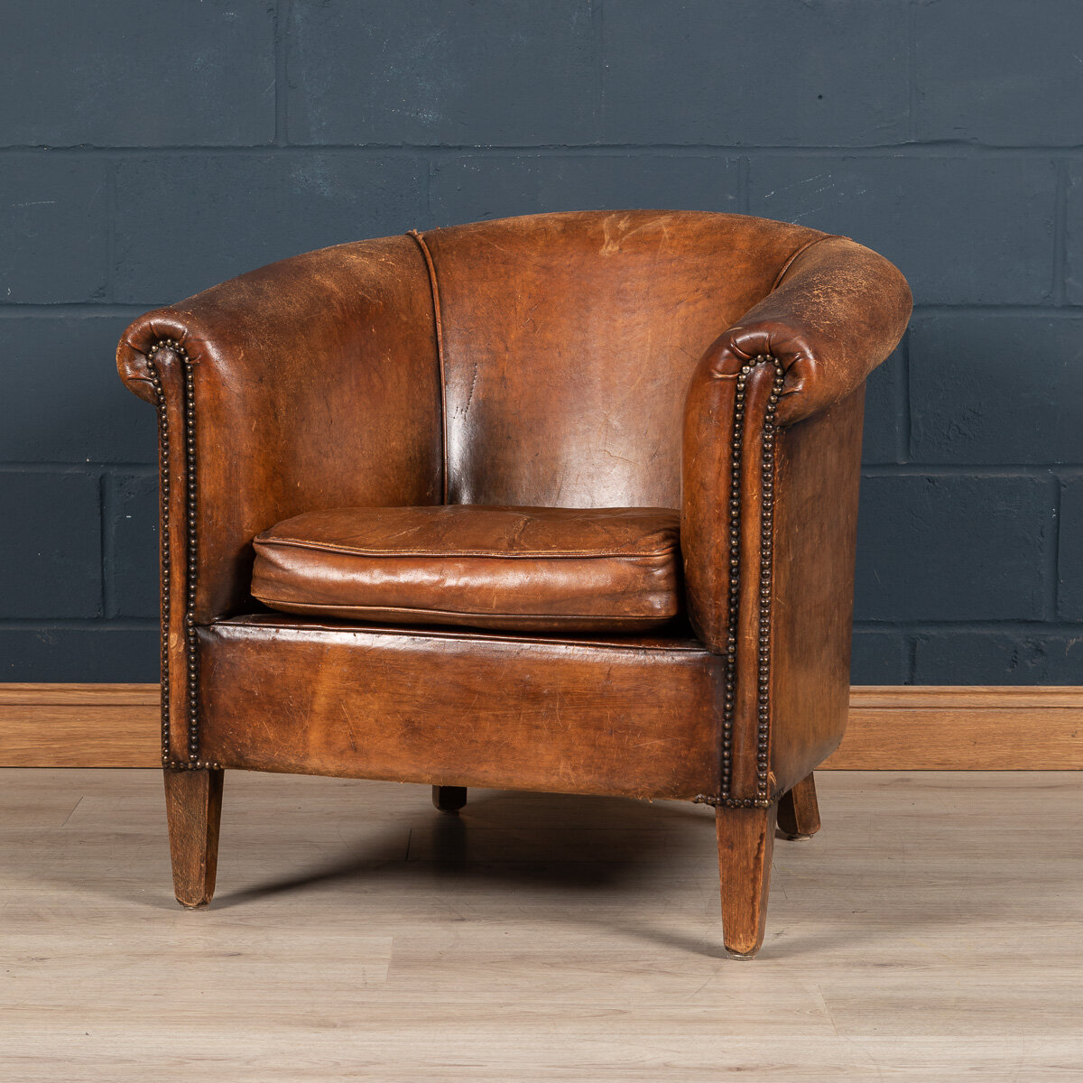 A sheepskin leather tub chair, Holland, late 20th century