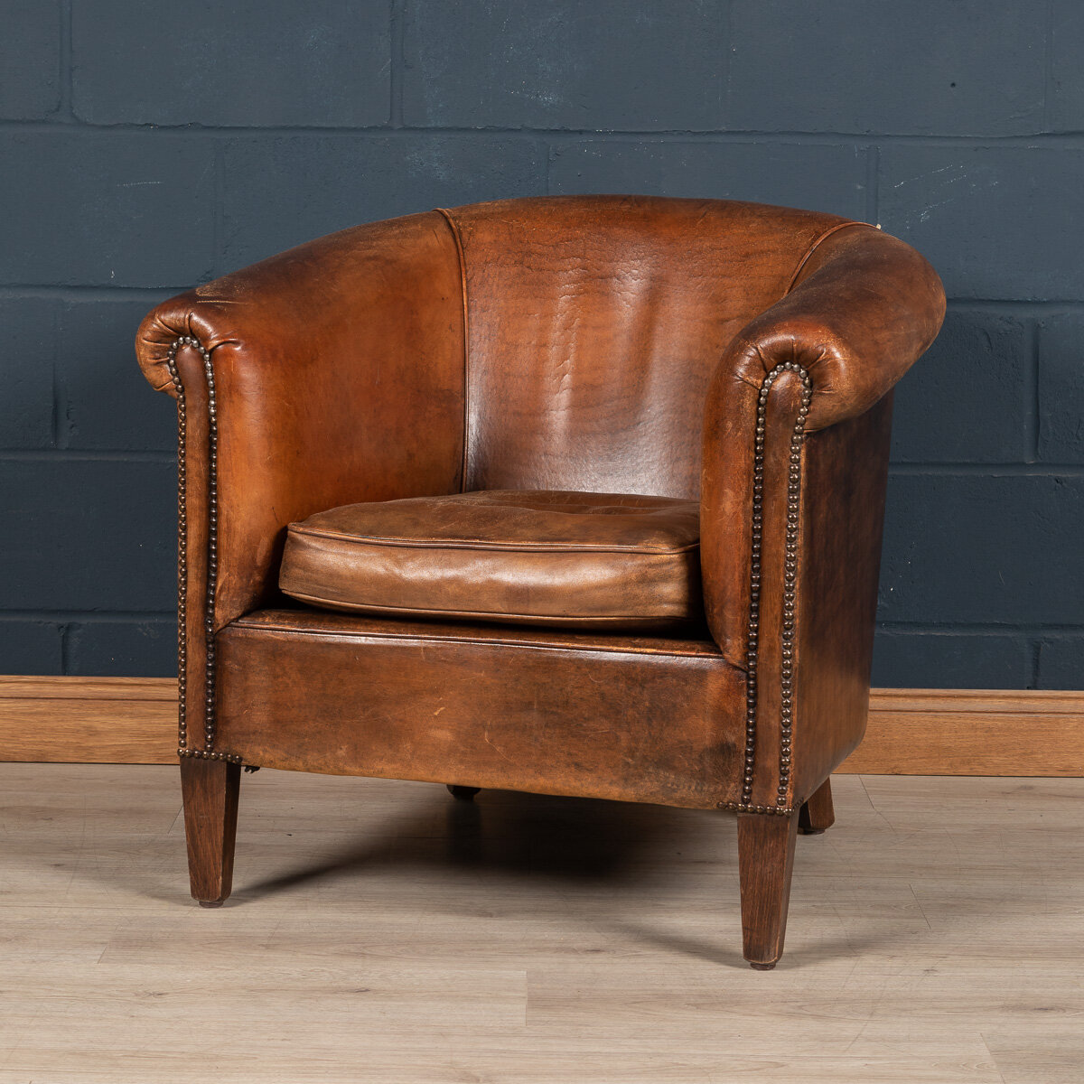 A sheepskin leather tub chair, Holland, late 20th century