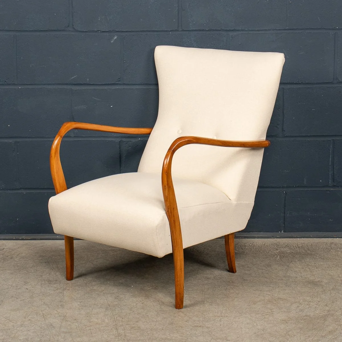 A white fabric armchair in the manner of Paolo Buffa, Italy, circa 1960
