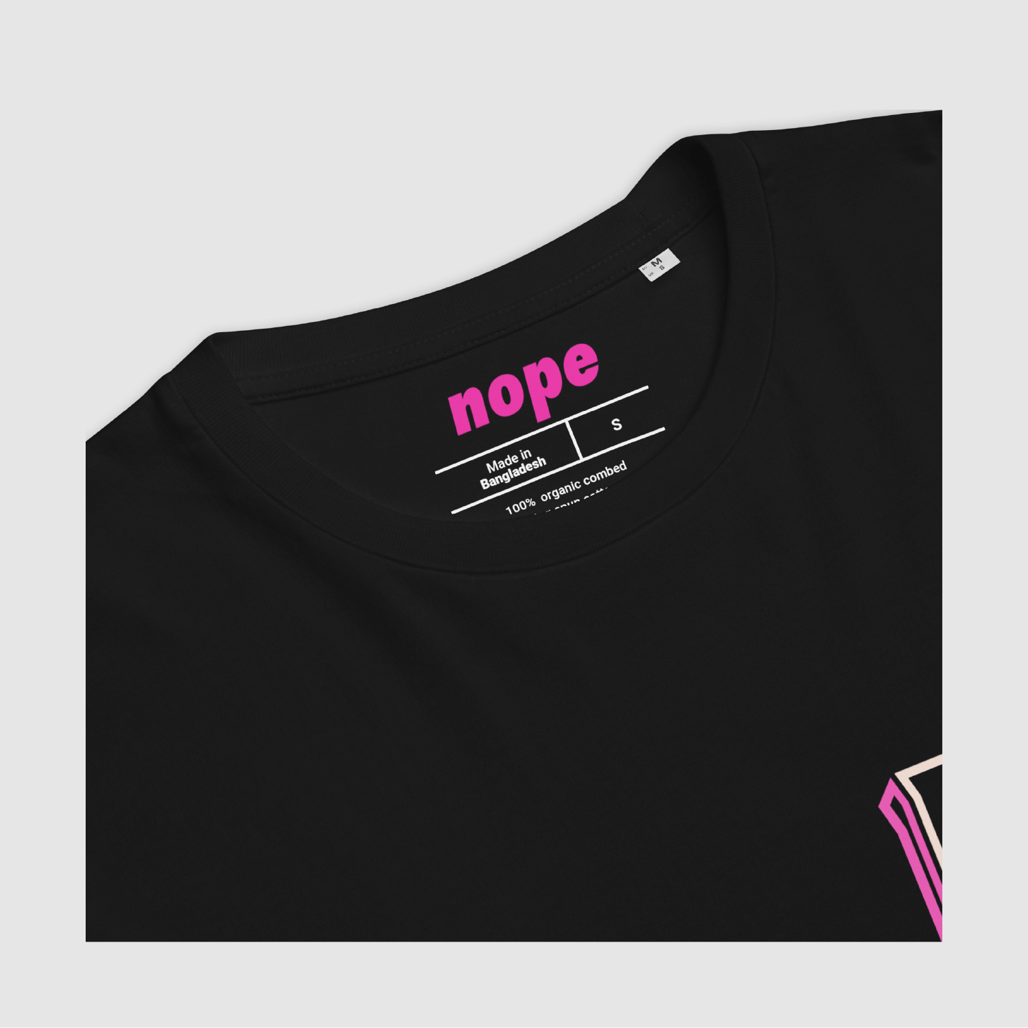 Neck print detail of Black Nope 3D Logo Tee with pink branding and sizing