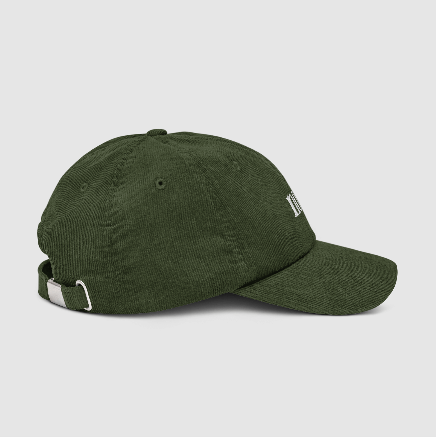 Angled cap shot showing the soft crown and embroidered text