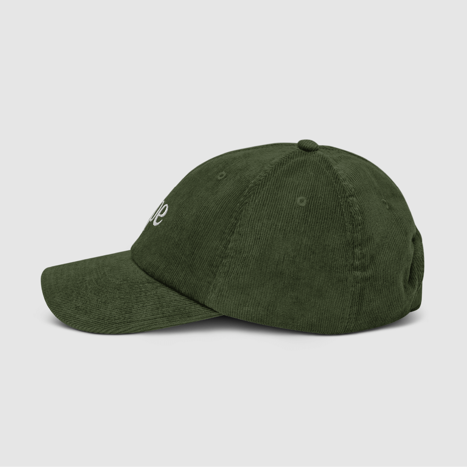 Side view of the olive cord cap with visible brim curve and tonal stitching