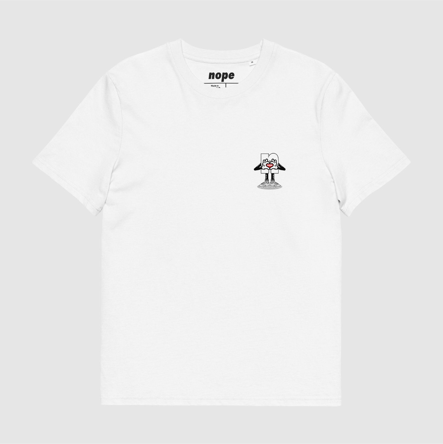 Nope MLLW Tee Front White: Front view of white t-shirt with mini graphic on the left chest