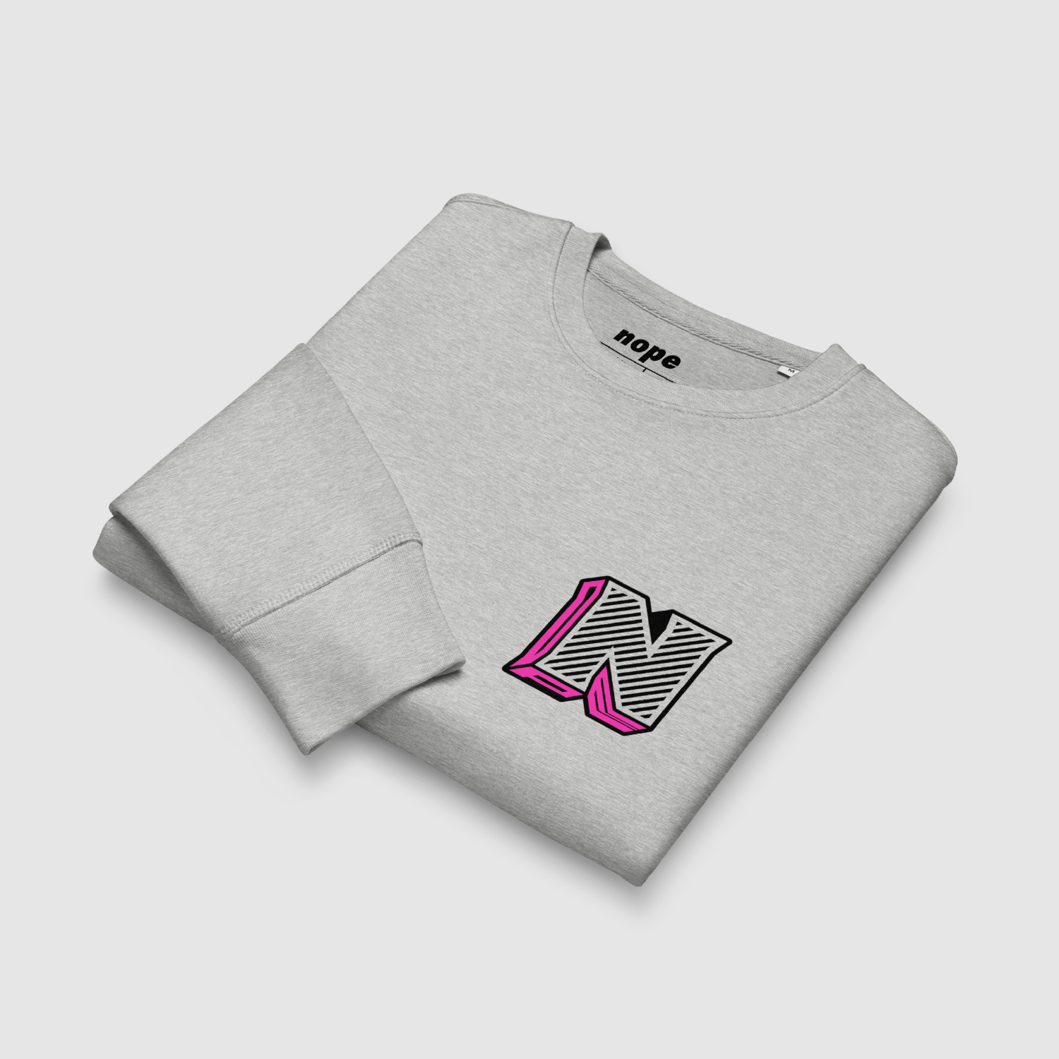 Folded Nope Logo Sweatshirt in heather grey showing front print Back view of the sweatshirt – clean and unprinted, solid grey