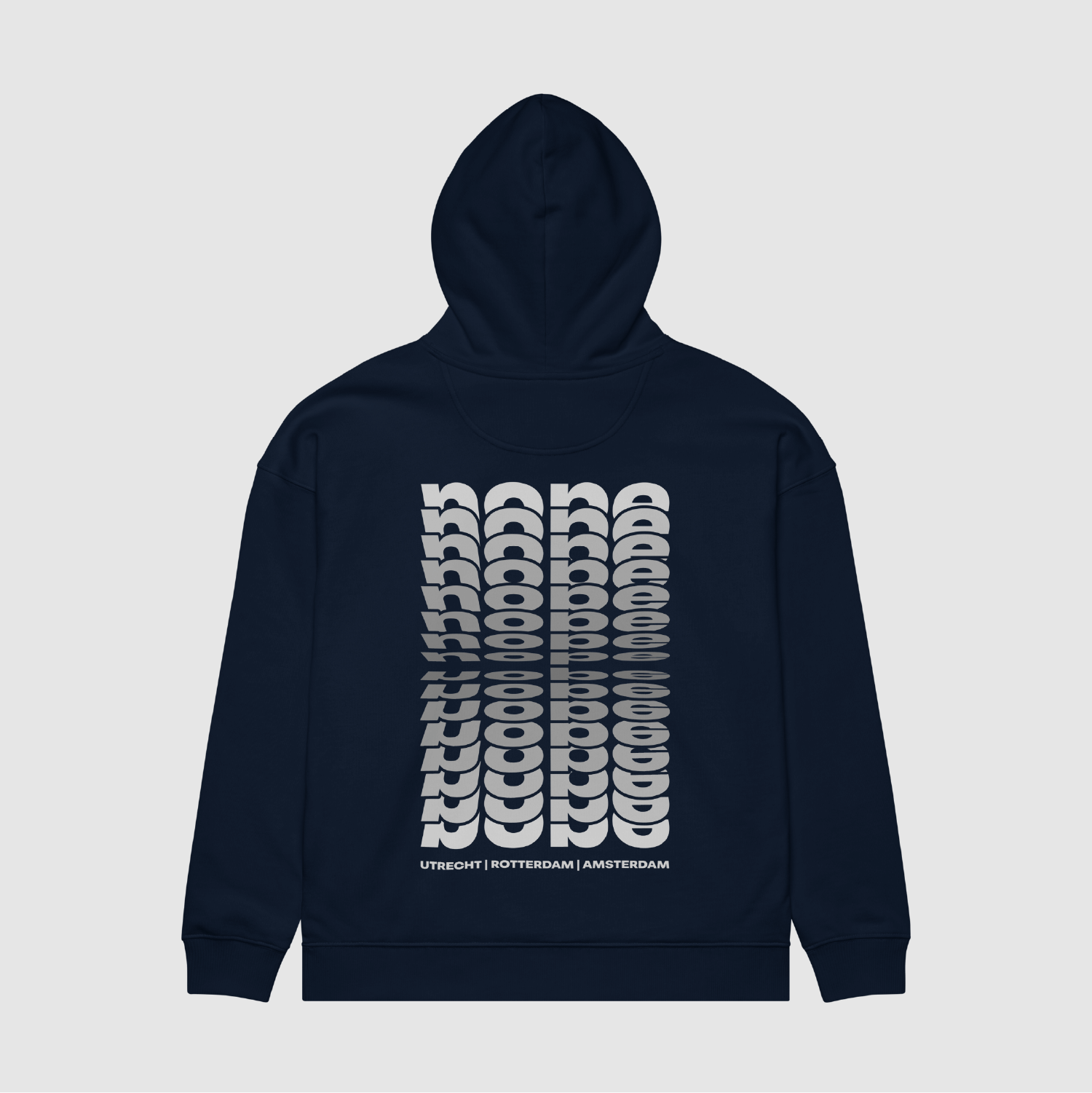 Back view of navy hoodie with stacked NOPE city grid graphic by Mr. Nope – part of No Ordinary System collection
