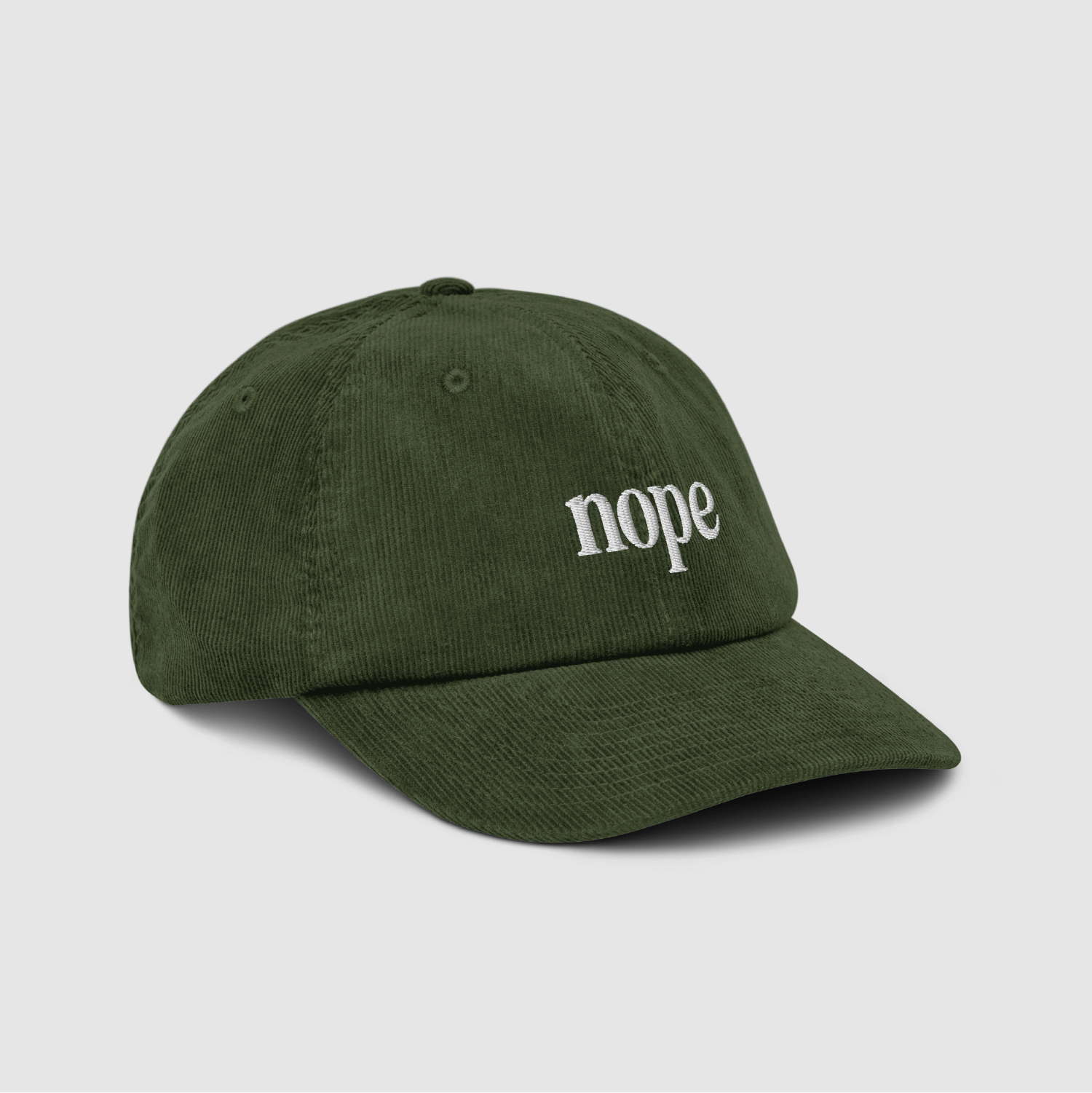 Side-back angle of the olive dad cap showing construction and strap detail Angled cap shot showing the soft crown and embroidered text
