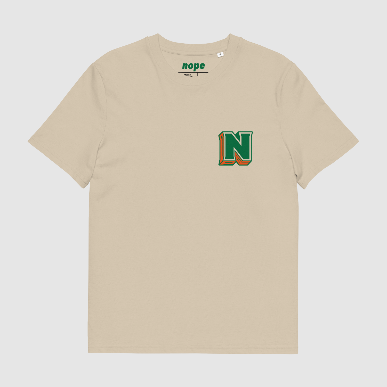 Desert Dust Nope 3D Logo Tee with green and orange chest print by Mr. Nope