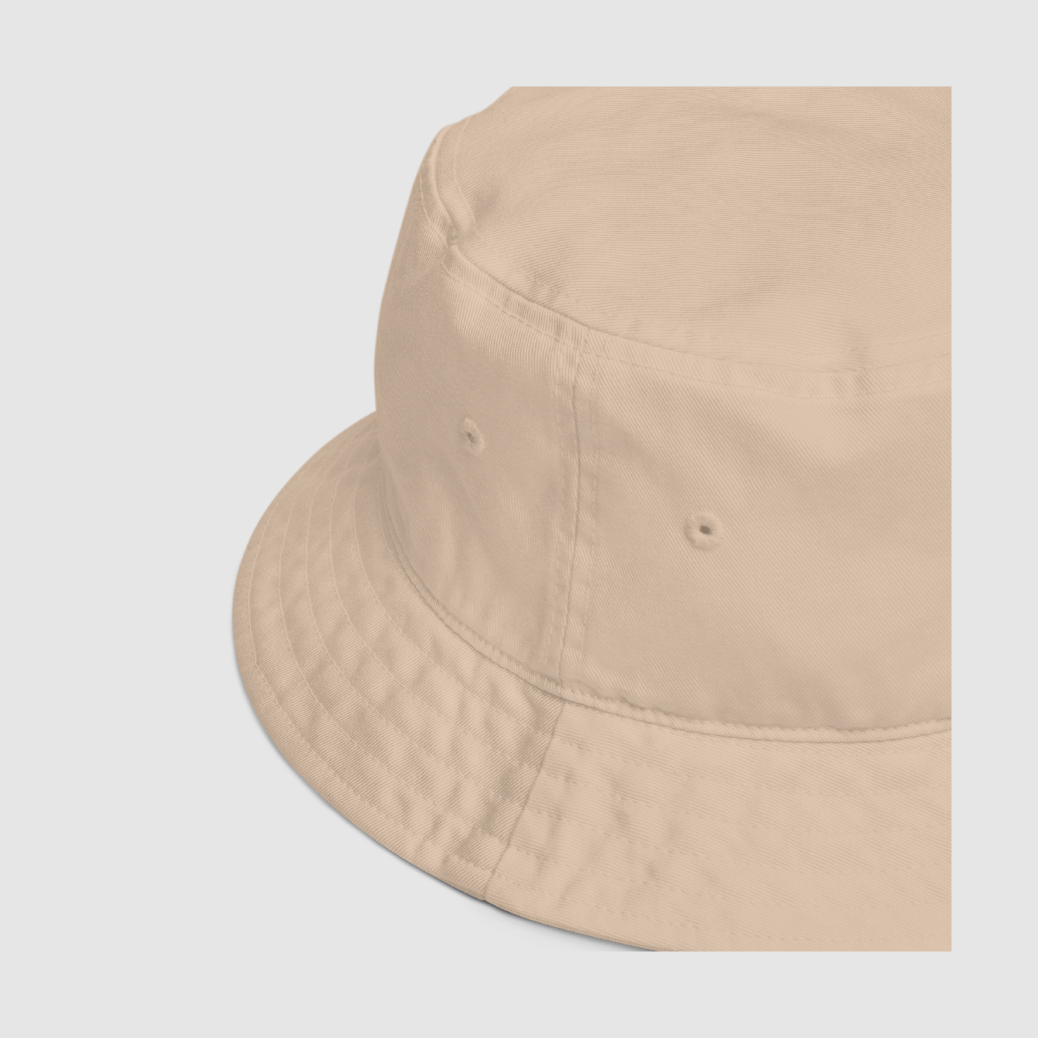 Side view of the Trust Us™ Bucket Hat showing breathable eyelets and soft brim