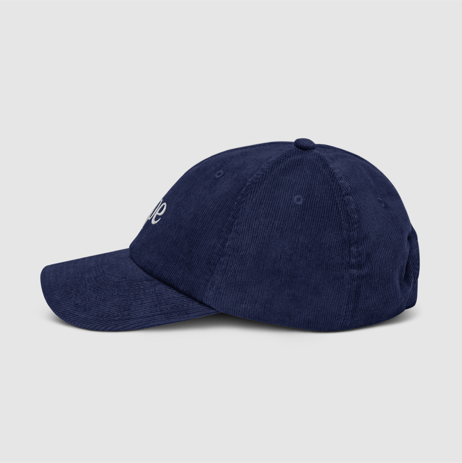 Side profile of the Oxford Navy corduroy cap with clean panel lines